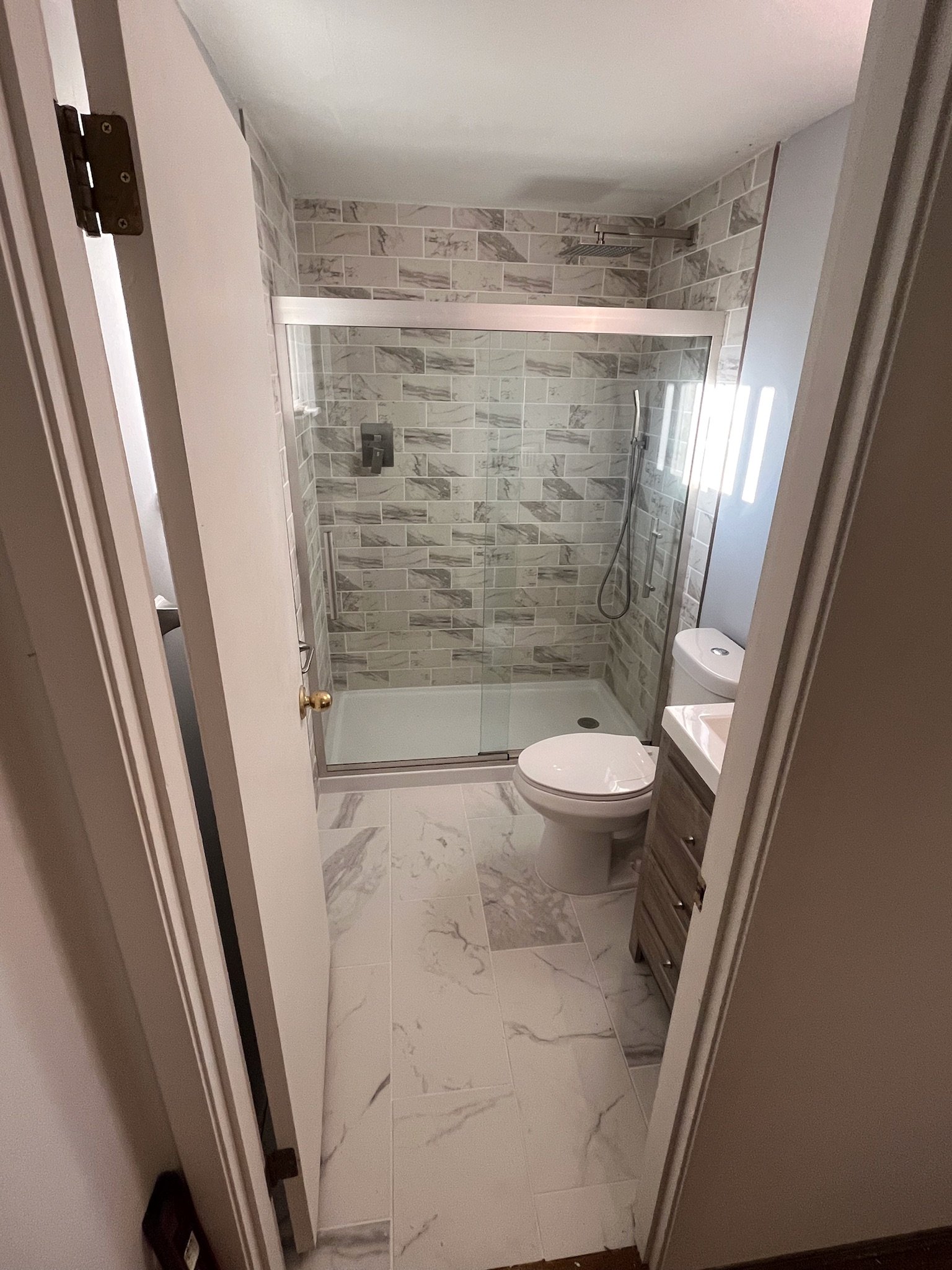 modern bathroom remodel Dayton Ohio walk in tile shower and updated flooring