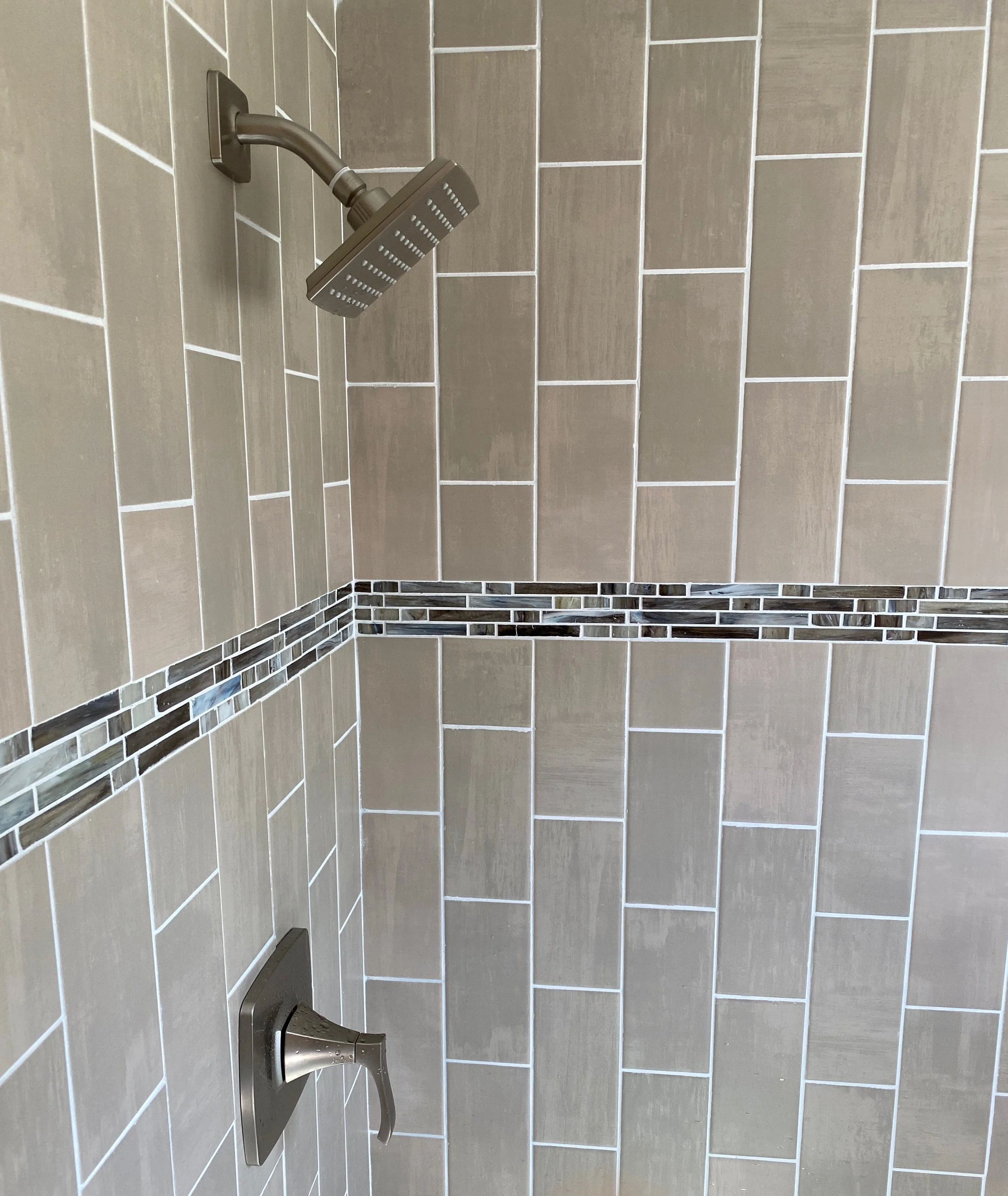 vertical tile shower design Dayton Ohio modern custom tile installation neutral tones