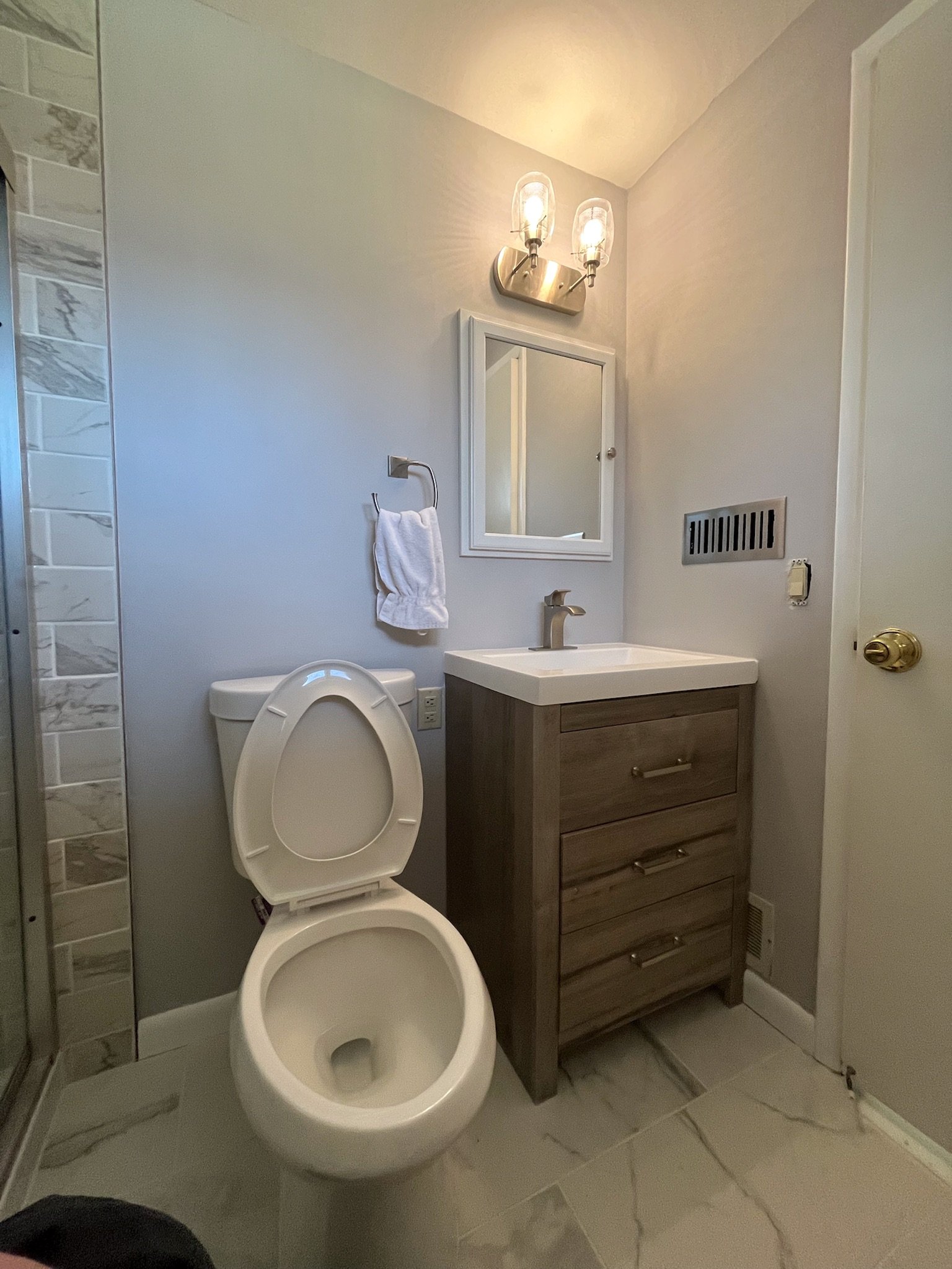 bathroom remodel Dayton Ohio vanity installation tile flooring and shower upgrade