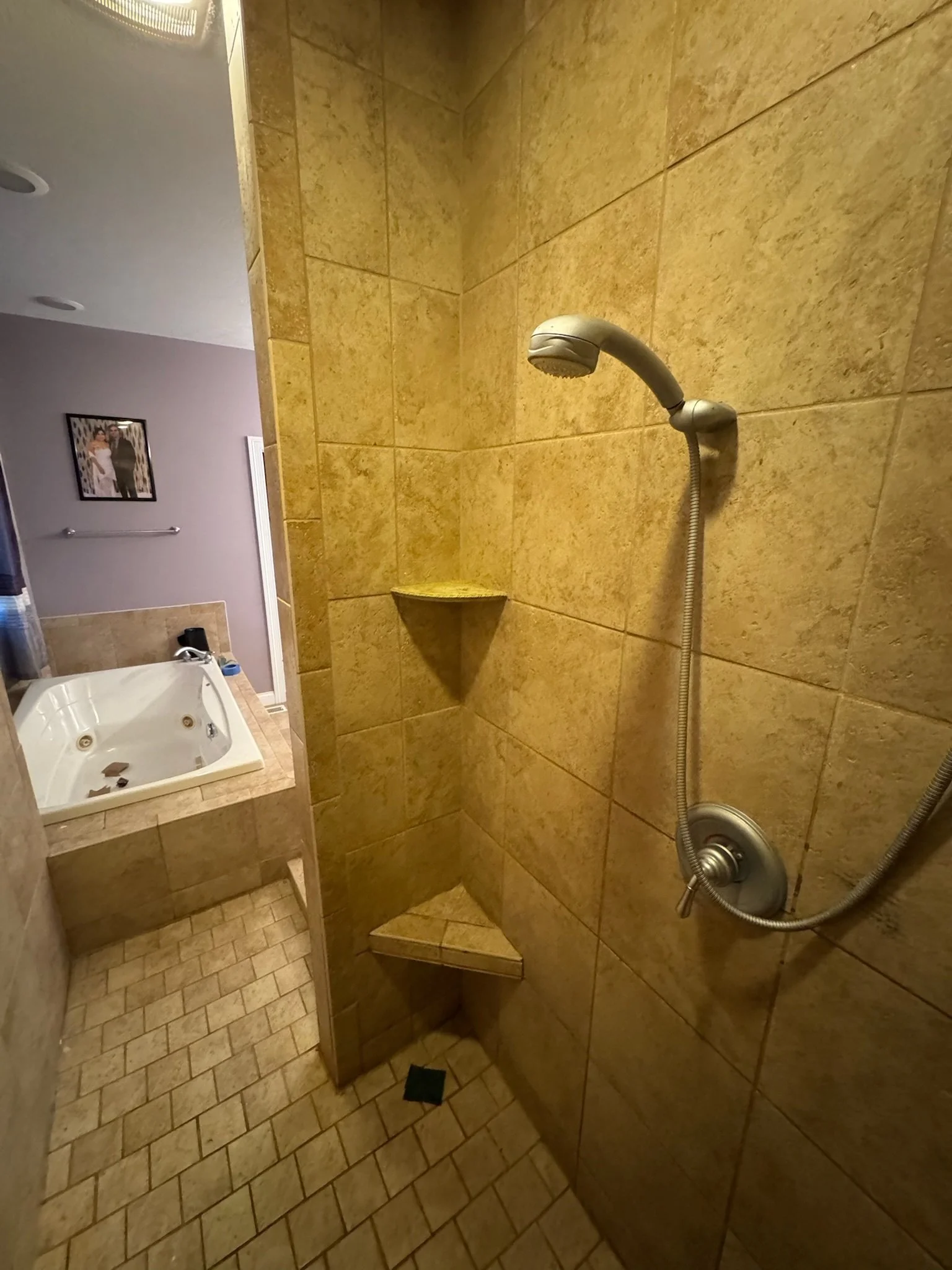 old tile shower before renovation Dayton Ohio worn shower walls and outdated fixtures