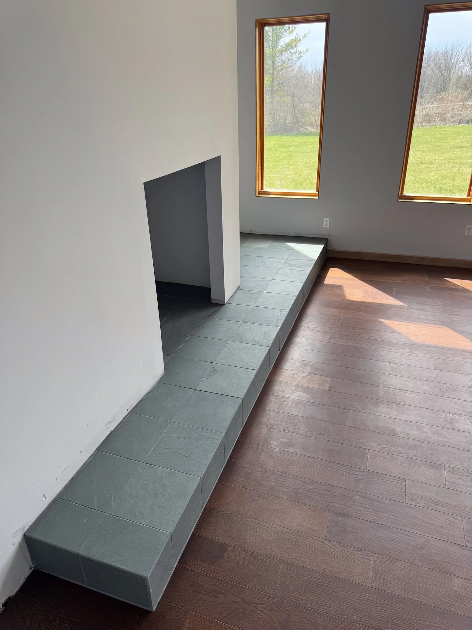 slate tile hearth installation Dayton Ohio fireplace accent tile custom flooring design