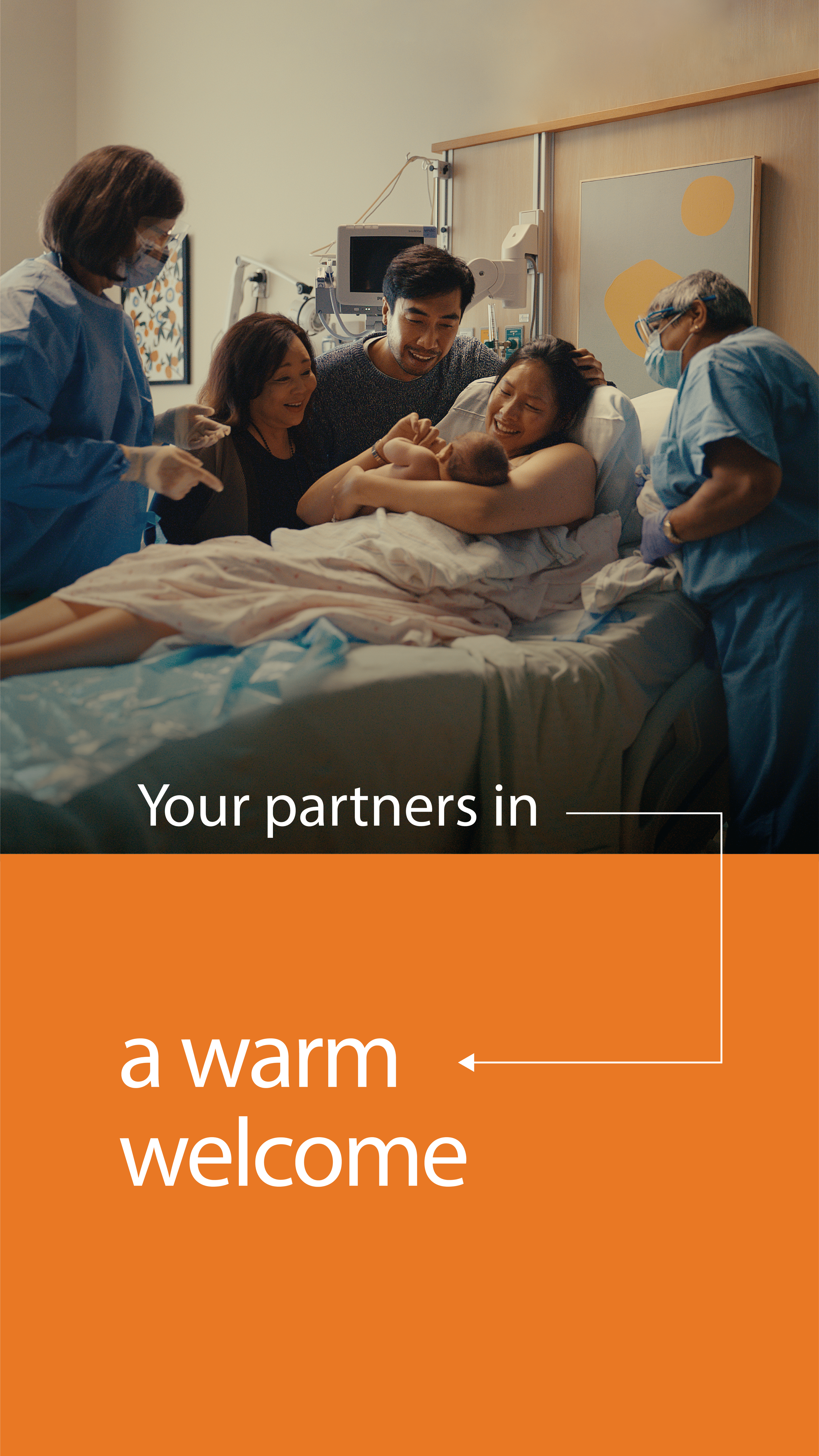 Family and medical staff in hospital room celebrating newborn baby, with text 'Your partners in a warm welcome.'
