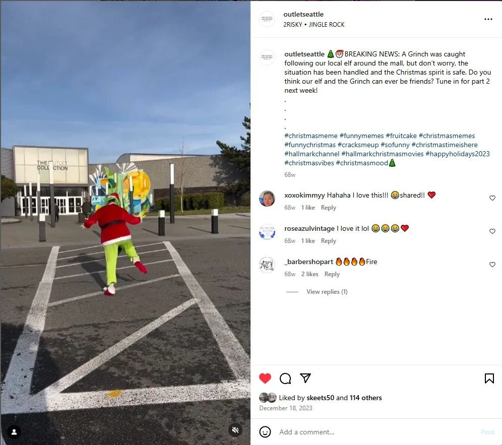 A person in a Grinch costume running across a crosswalk with a shopping mall entrance in the background.