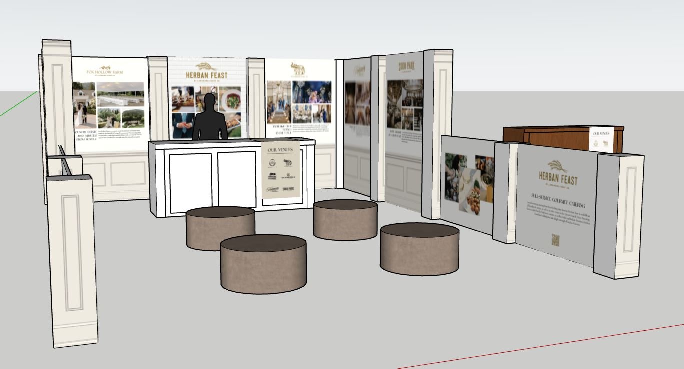 3D rendering of a trade show booth layout with display panels, a front counter, circular seating, and promotional graphics for "Herban Feast" catering.