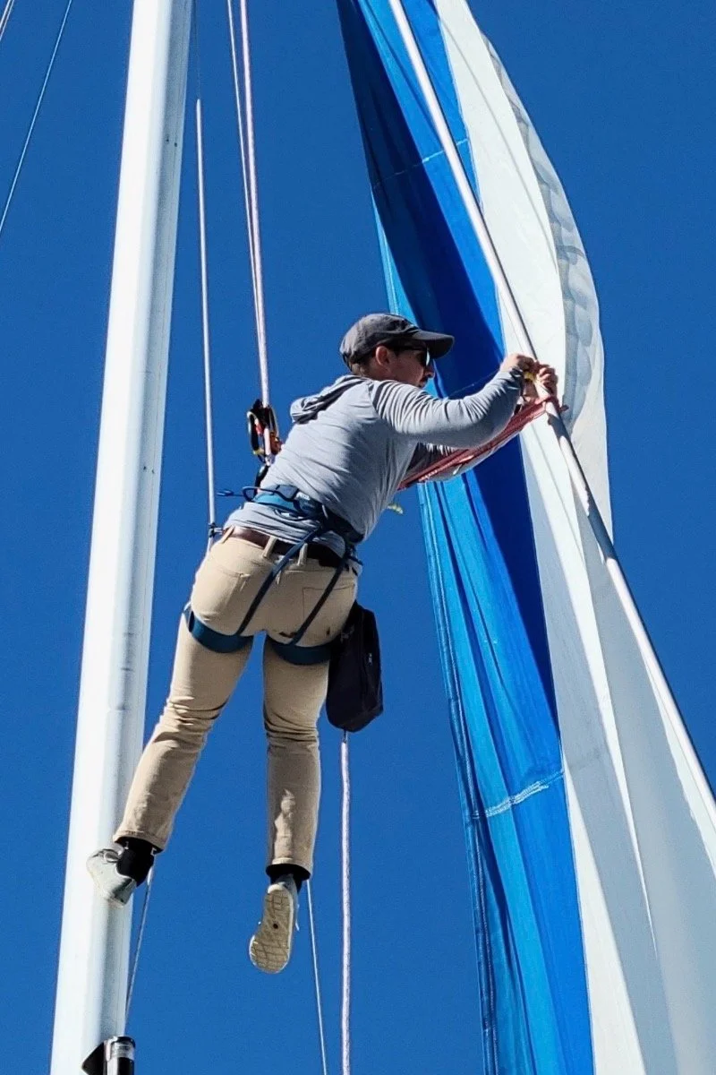 Burgoo Boat Works team repairing sailboat on Lake Lanier