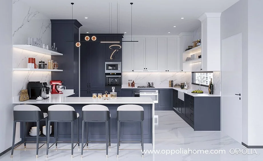 Modern kitchen with navy blue and white cabinets, marble backsplash, and minimalist decor. Features a breakfast bar with four stools, pendant lighting, and open shelving with kitchen essentials.