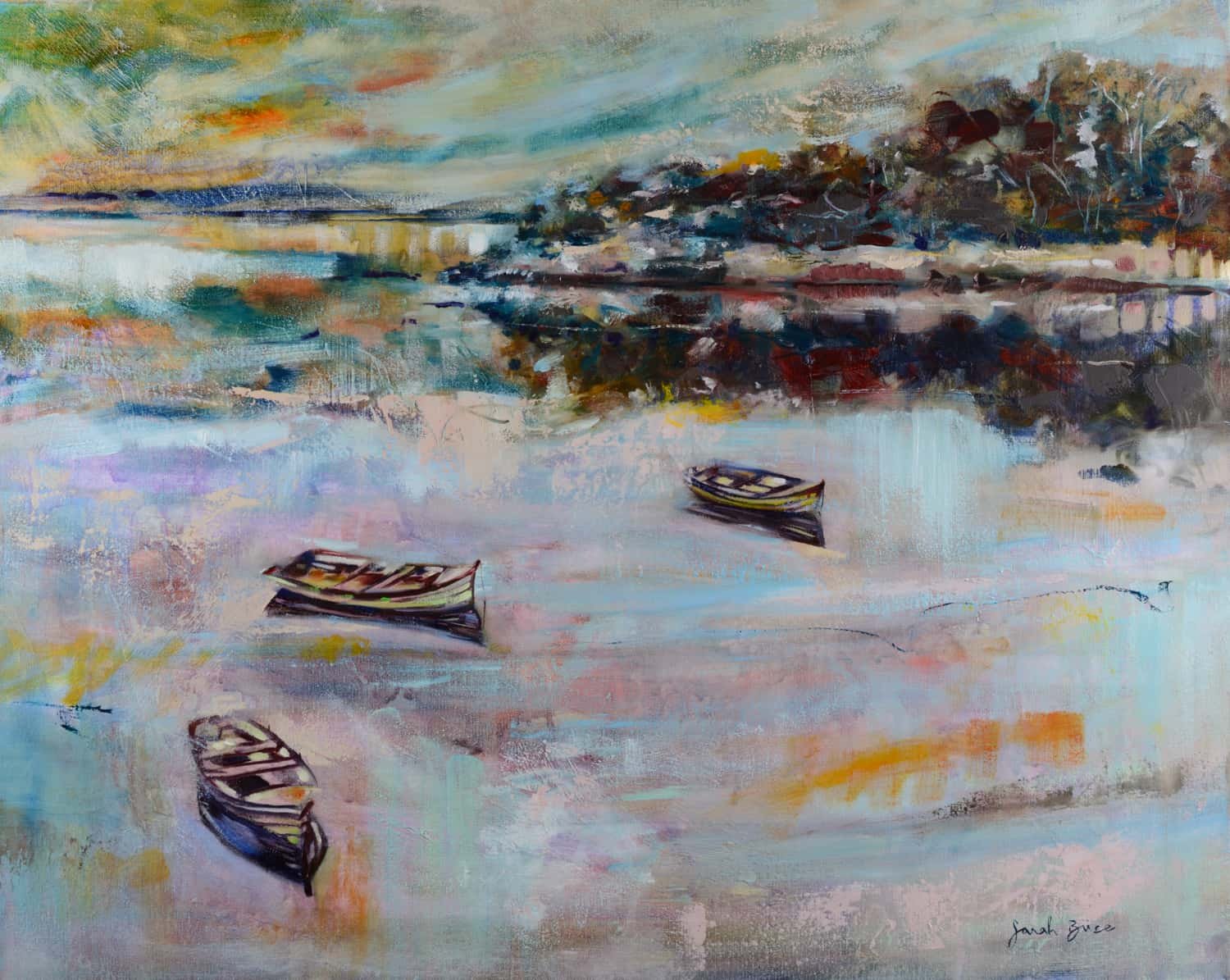 Boats sit on reflective water in Ireland.