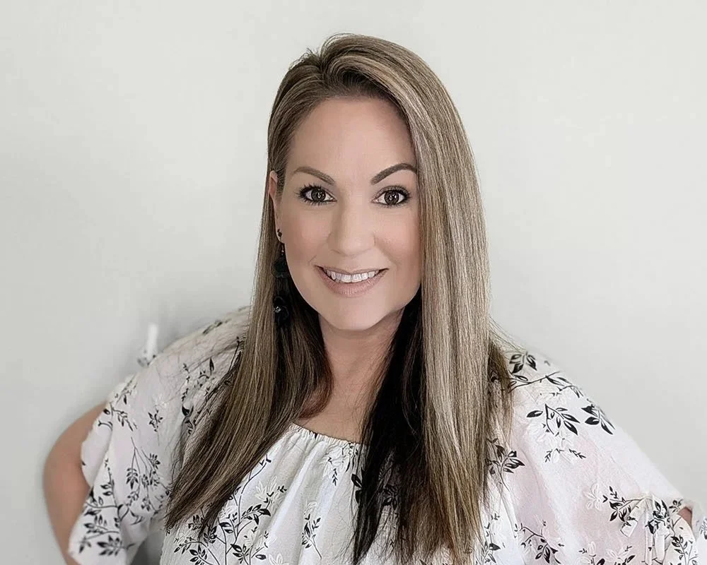Preferred Designer Miranda Gasek creates cohesive interiors for Bronze Door Homes—materials, lighting, and furnishings that elevate each custom build.