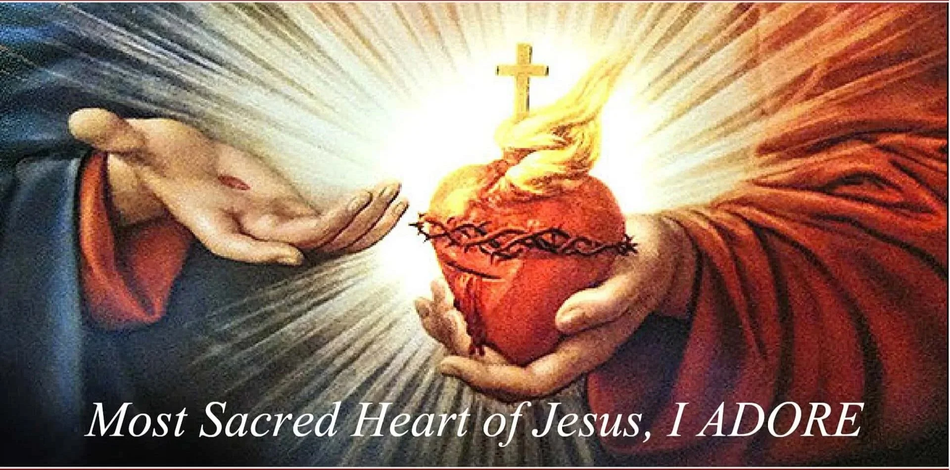 Artwork depicting two hands holding a sacred heart with a cross and flames, surrounded by radiant light, with the text "Most Sacred Heart of Jesus, I ADORE" at the bottom.