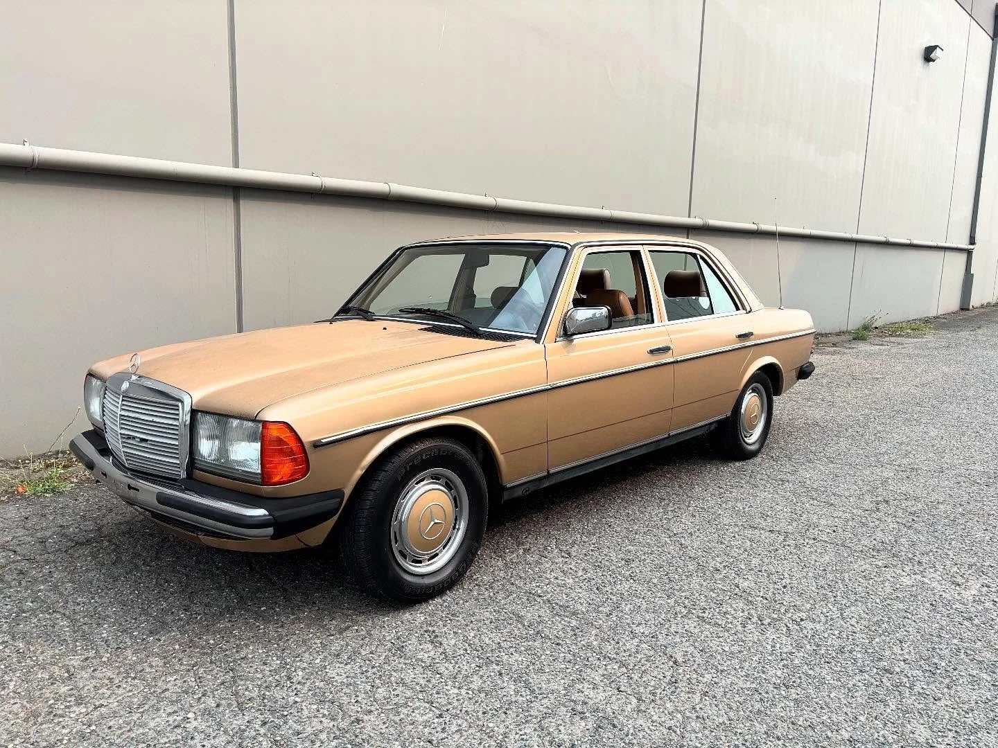 This 1983 230e gray market gem is available for sale! I would still consider the project as it needs some basic maintenance items but what a beauty! It is unique and it has a five speed manual transmission cloth seats roll up windows and a power sunr