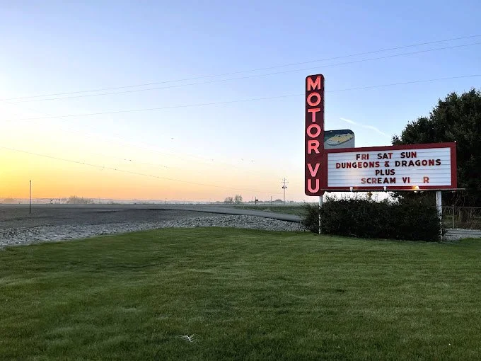 parma motor-vu sign from outside green grass