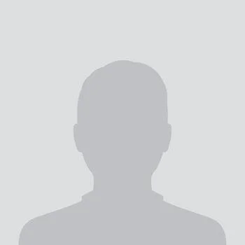 A grayscale placeholder silhouette of a person.