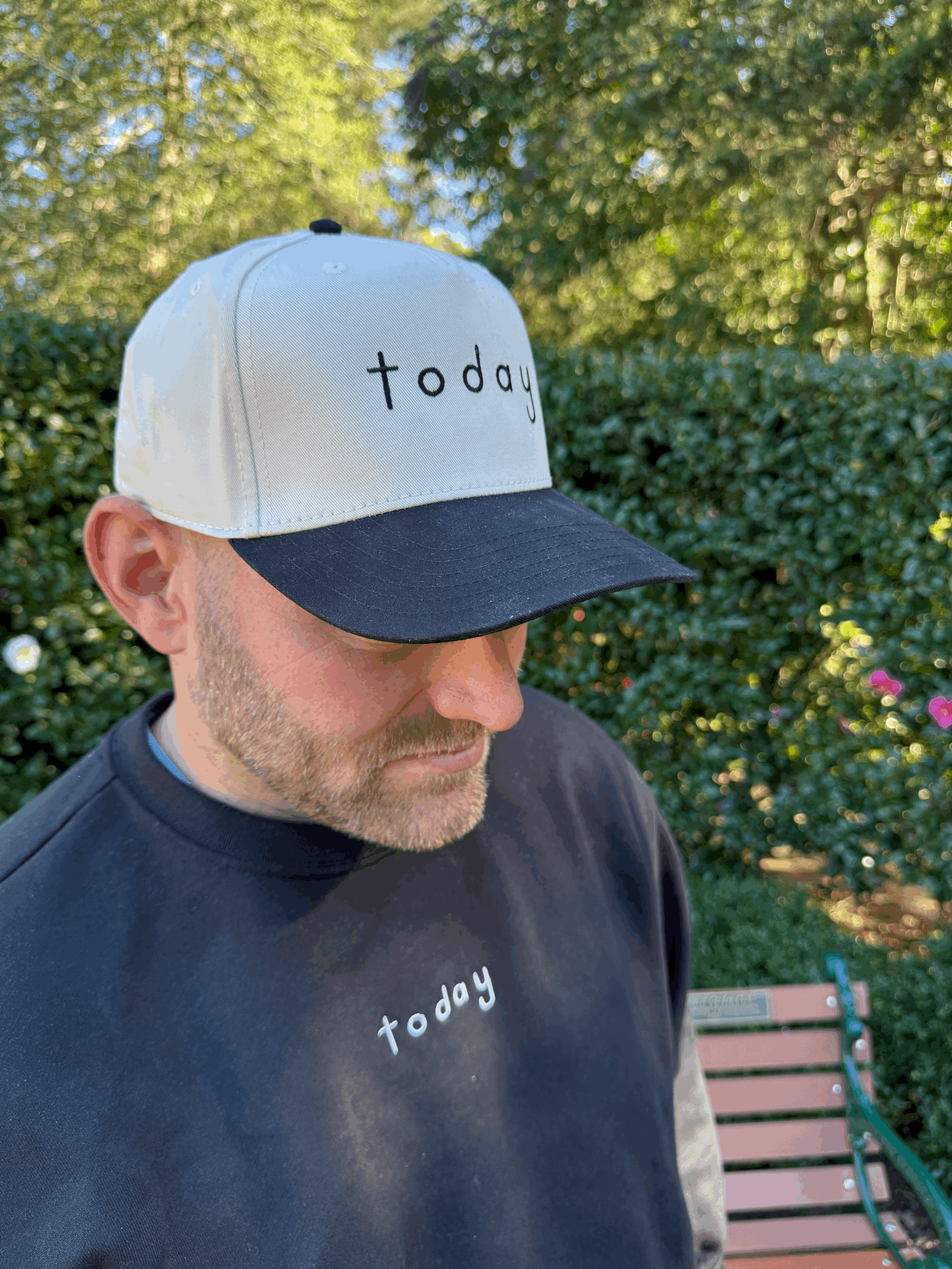 man-wearing-black-five-panel-hat