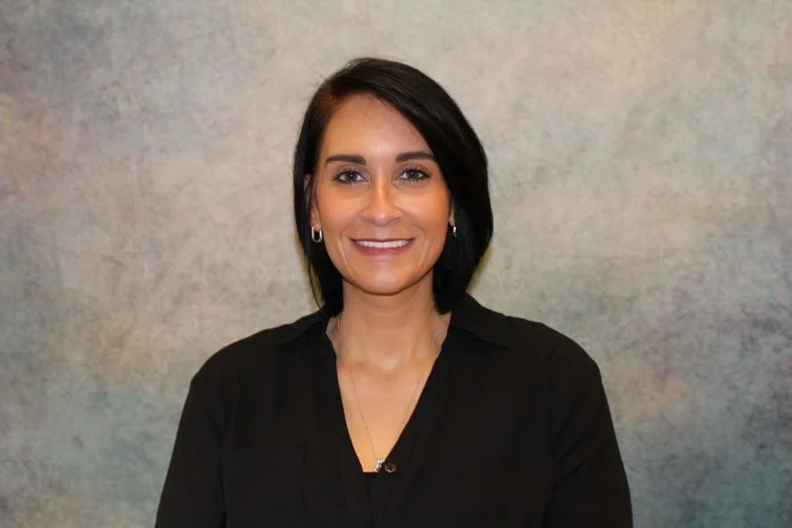 Team member at Bighorn Development Center in Sheridan, Wyoming offering child care and developmental screening services.