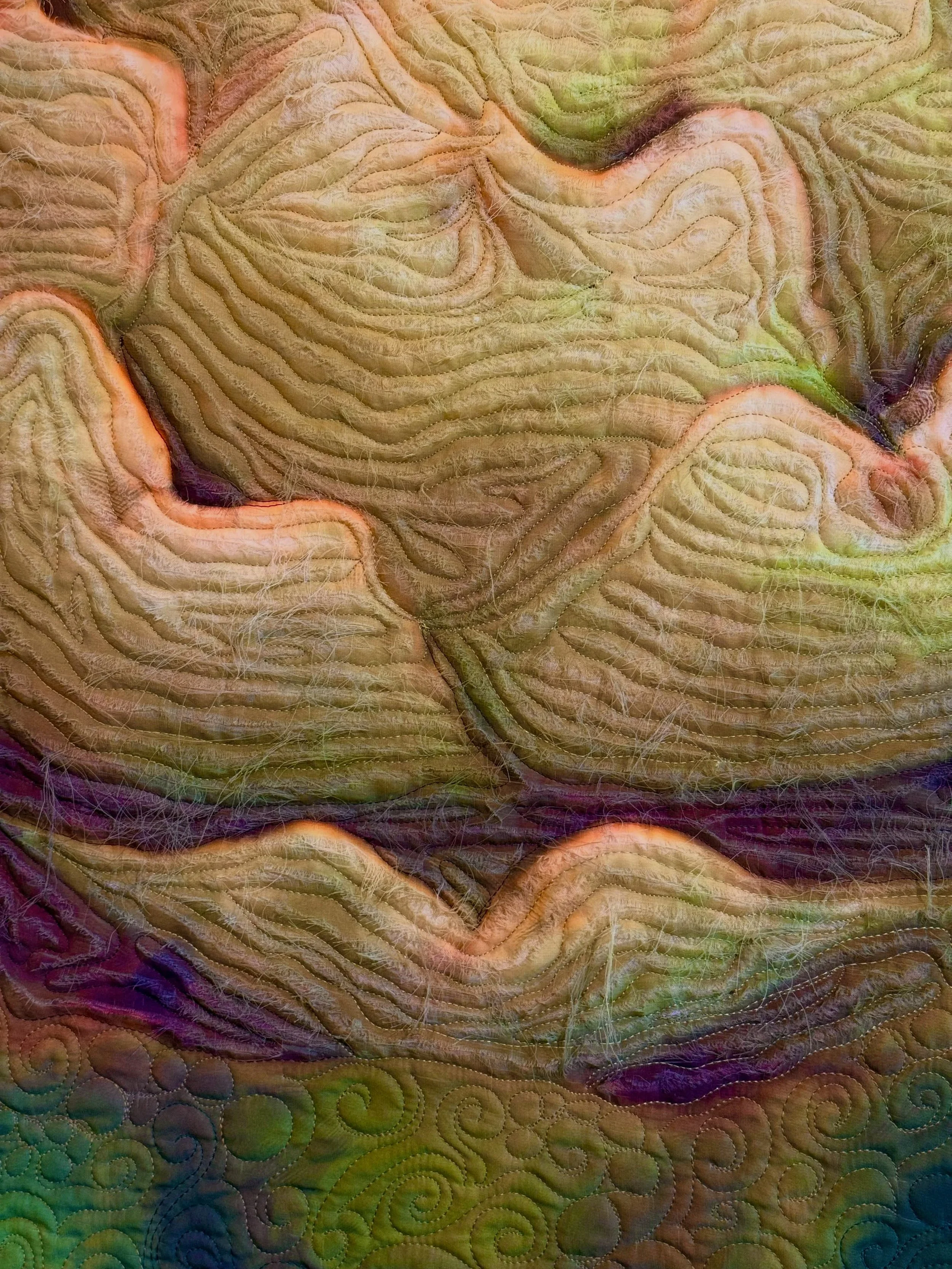 A closer look at the surface of Tasha Owen&rsquo;s work reveals layers that are easy to miss from across the gallery.

Soft fibers, stitching, and added texture interrupt the photographic image and create a surface that feels both familiar and altere