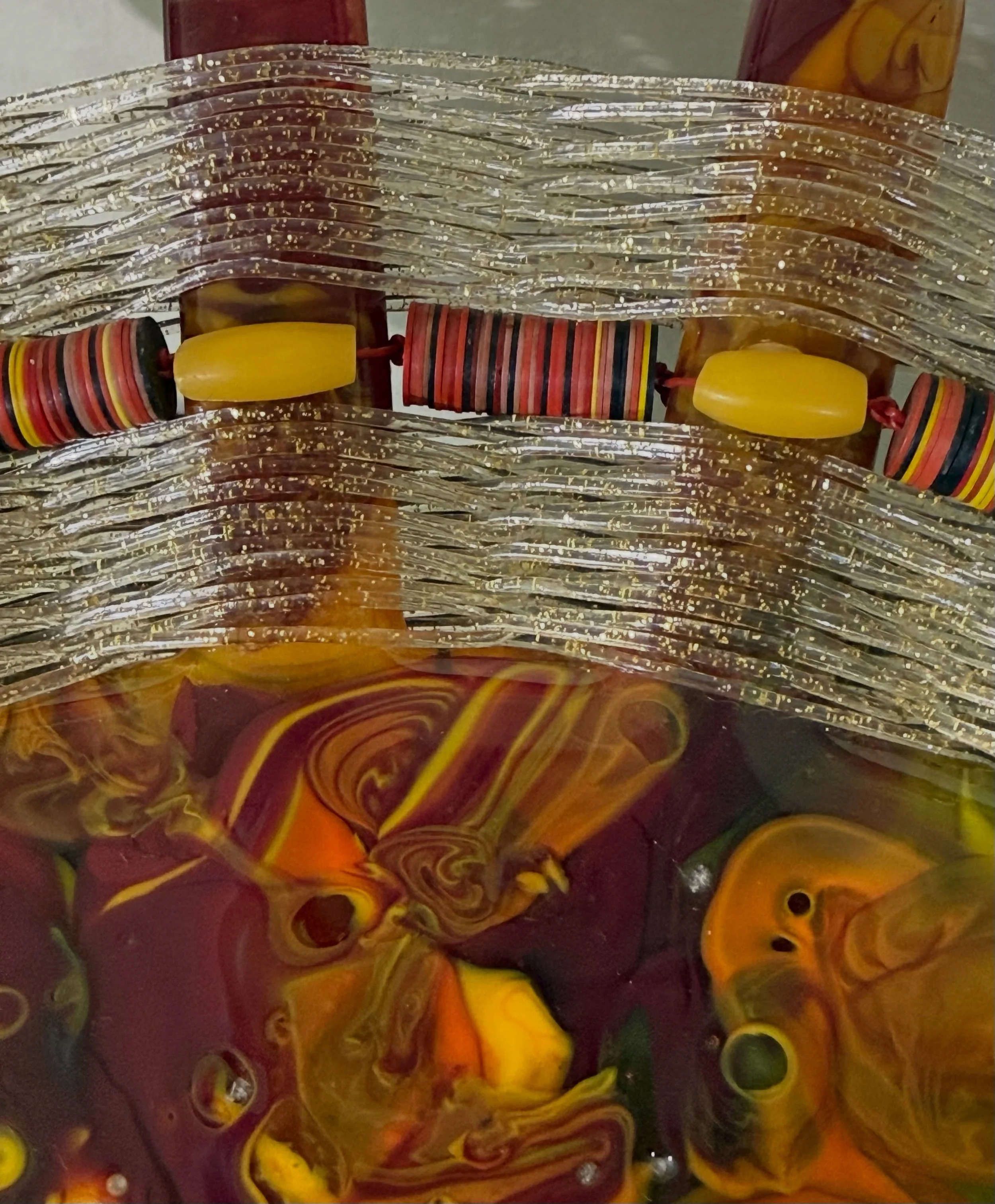 In @candacegpratt work, each material carries its own presence&mdash;the glass, the woven fiber, the beads.  It then comes together as one complete form.

Up close, those individual elements become part of the story of the piece.

Accumulation is on 