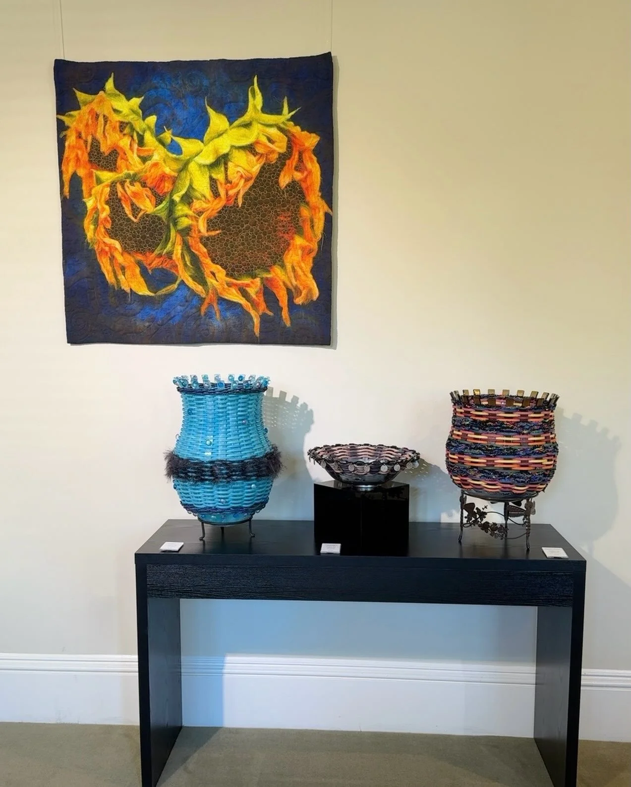 Two distinct approaches, brought together in Accumulation.

@tashaowenquilting layered textile work and @candacegpratt fiber pieces create very different visual experiences, but both reward a closer look.

Accumulation is on view through November 15 