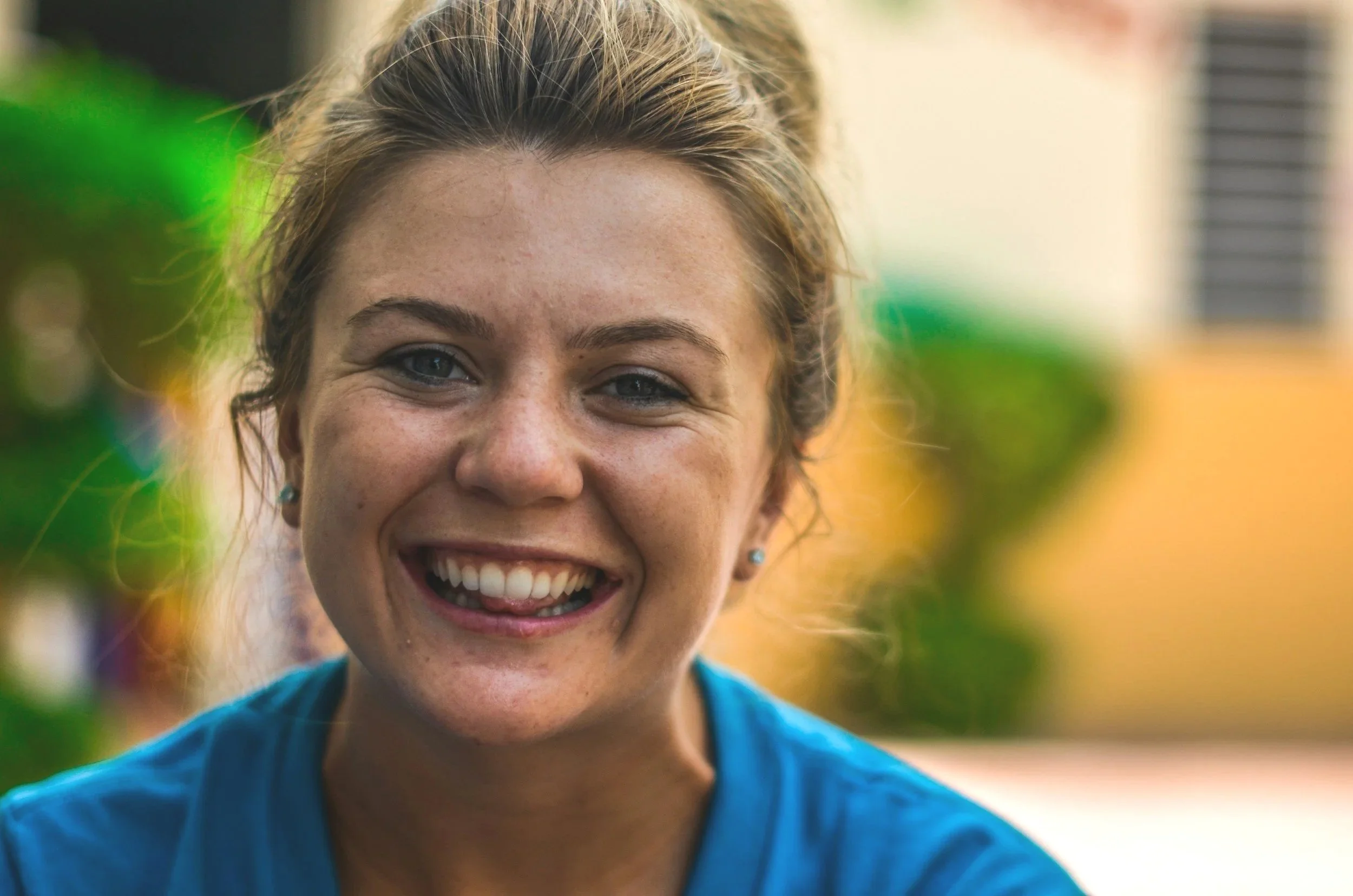 smiling woman - to help people see themselves as clients. not an actual client