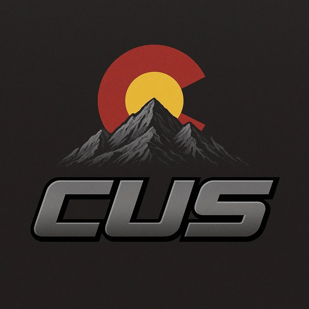 A stylized logo featuring a mountain with a yellow sun and red semi-circle behind it, and the word "CUS" in bold gray letters below.