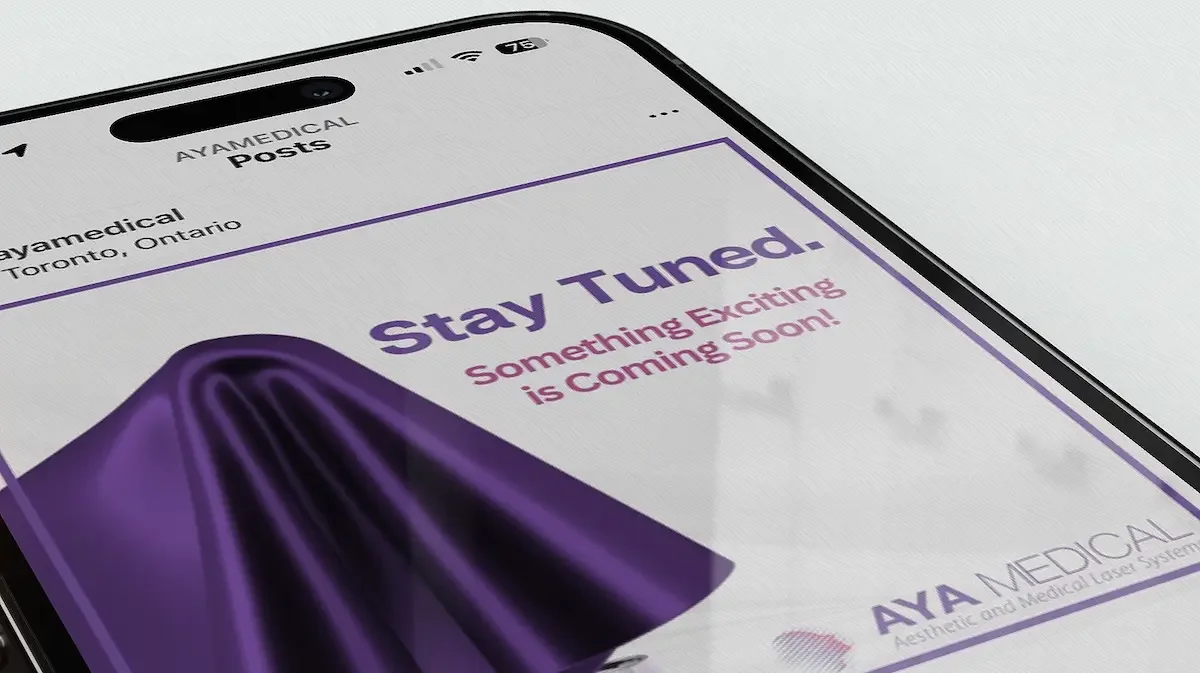 Smartphone showing an Instagram teaser post launching a medical company's new product with the caption: 'Stay Tuned. Something Exciting is Coming Soon!' 