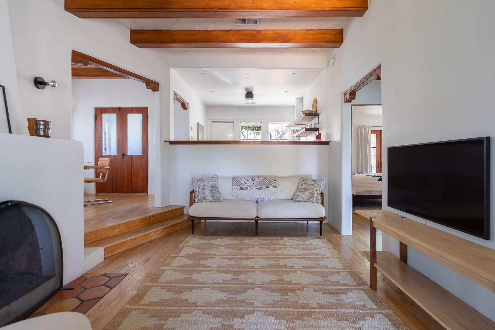 Real estate photography of an open living room and kitchen in Albuquerque, New Mexico