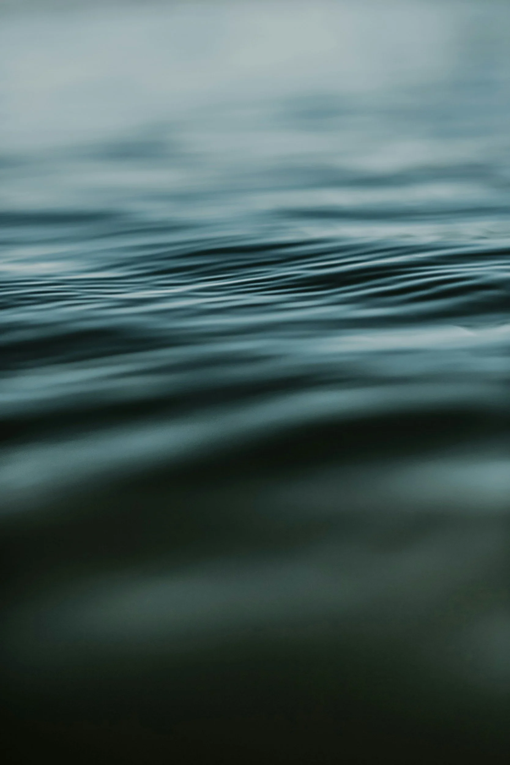 Close-up of calm water with gentle ripples.