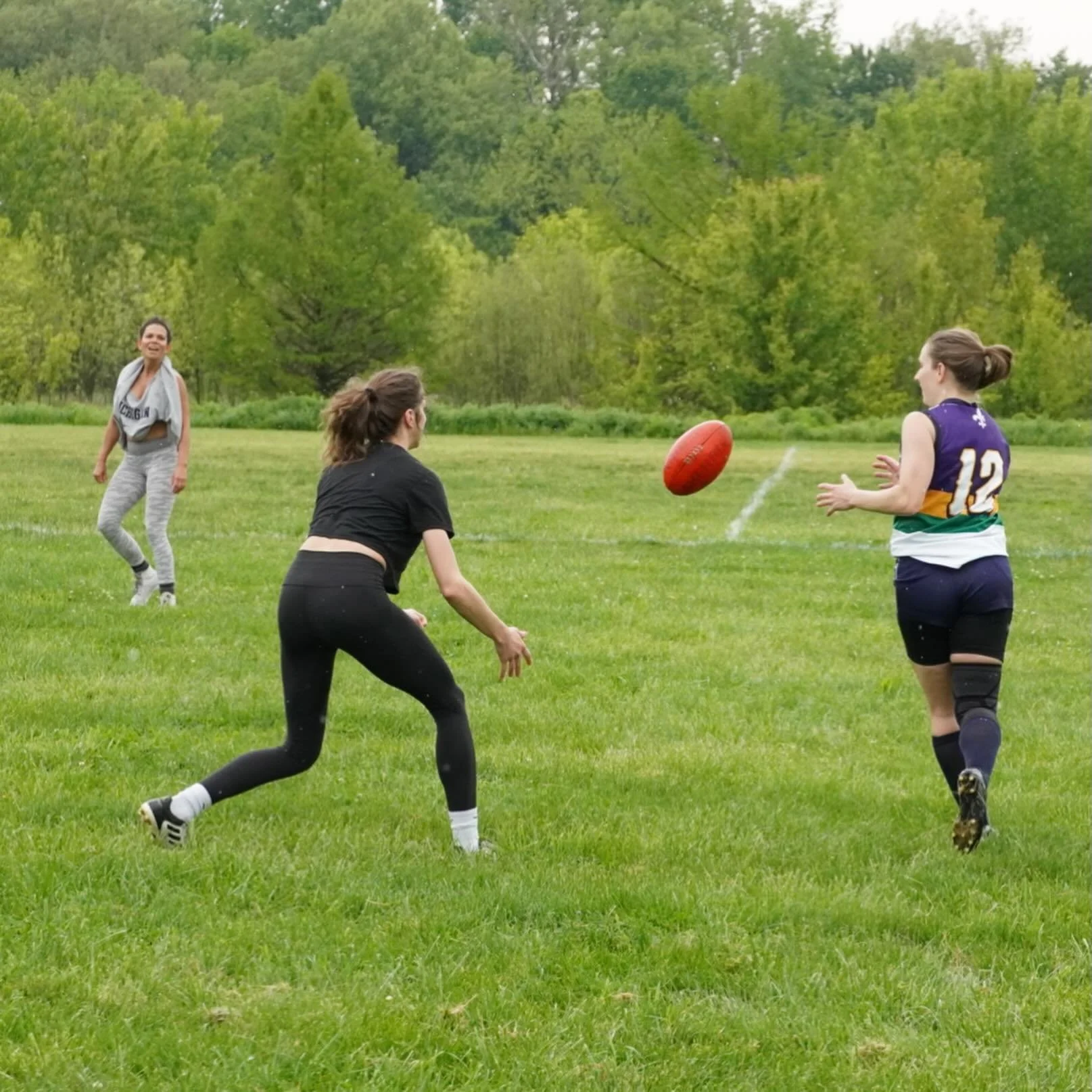 Much respect to a few female footy felines who braved the intermittent rain to get some kicks in on Saturday before the men&rsquo;s game. Led by former @usaflfreedomandrevos standout @katrinascherer, @ankawalkercoaching &amp; Nicole worked on their b