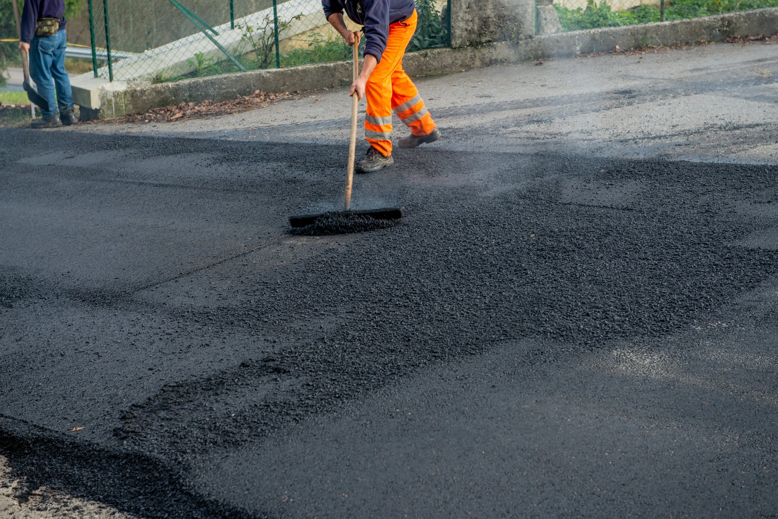 Fresh Asphalt Patching a Road