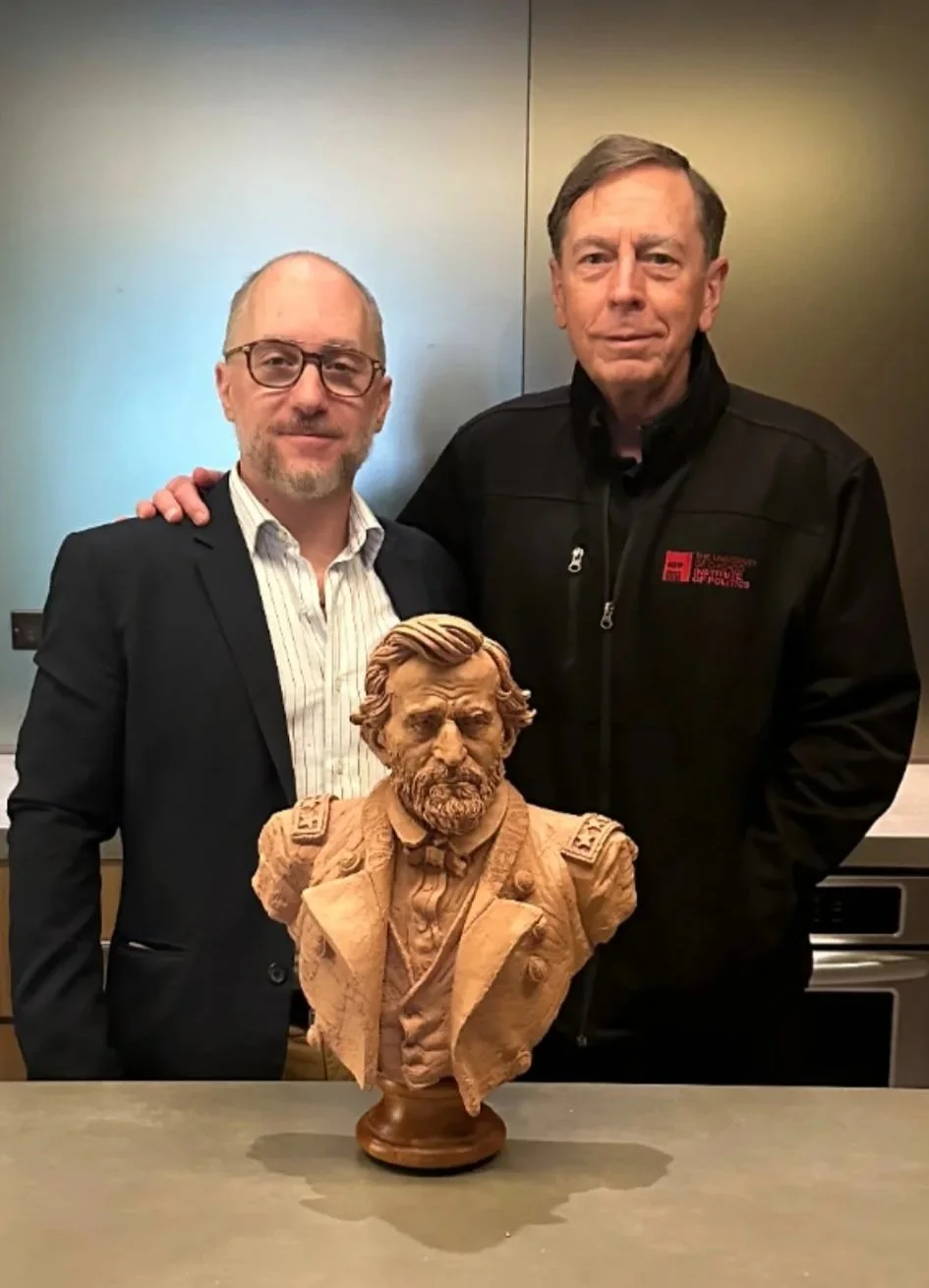 Frank with Ret. General David Petraeus and Frank's Grant bust. 