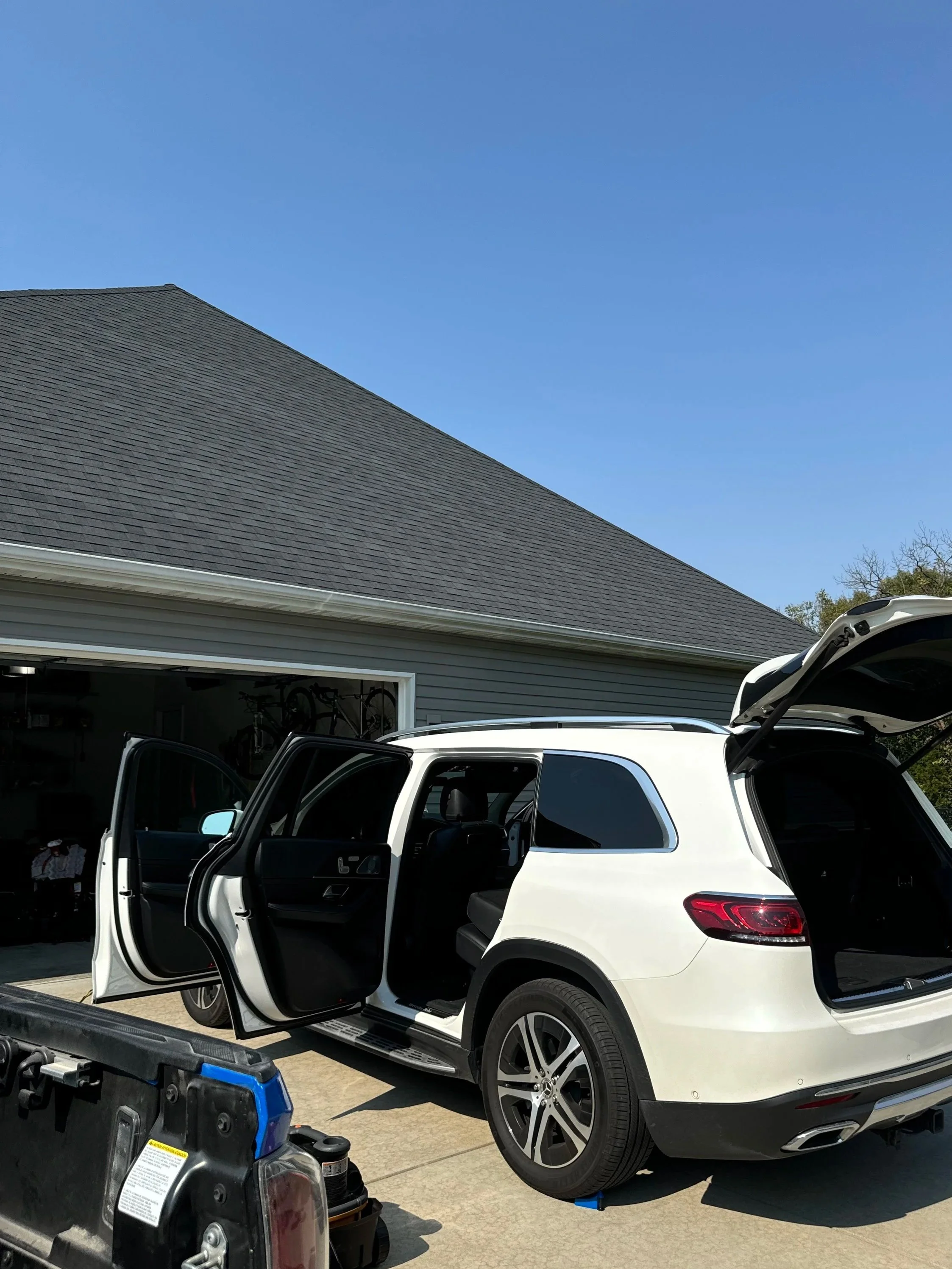 White SUV during an interior detail process.