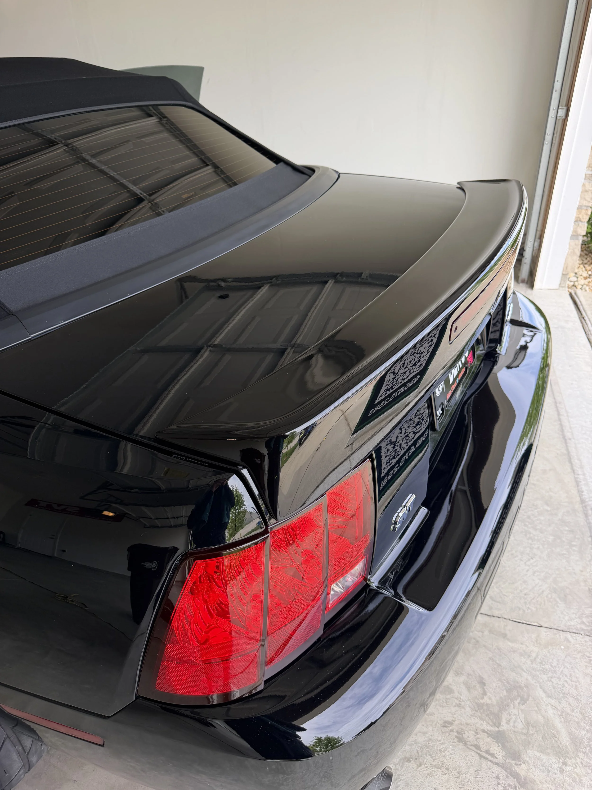Ceramic Coating & Paint Correction in 63367. Black Mustang GT 2003
