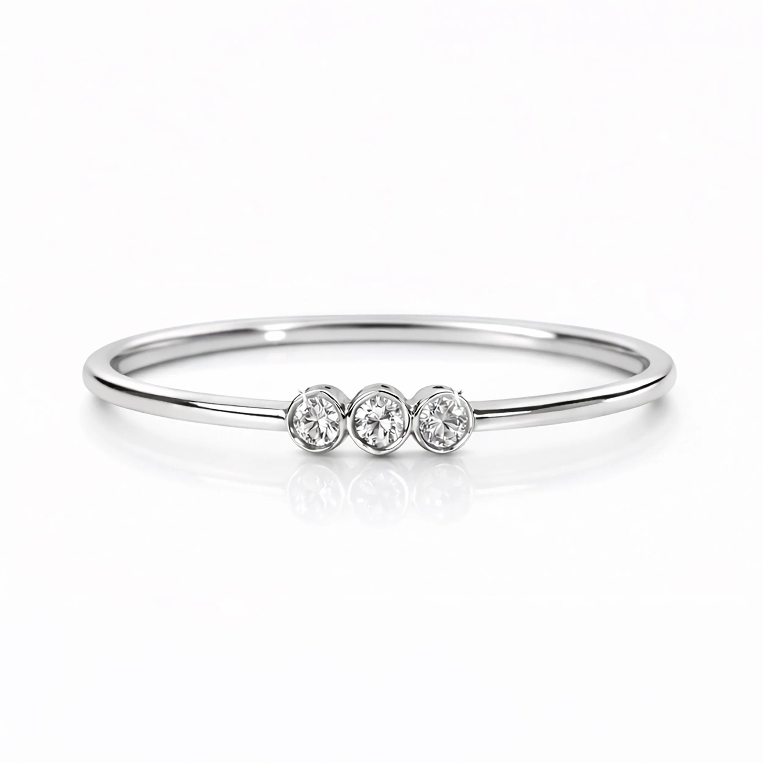 High-resolution close-up of a fine 14K Whit gold diamond stacking ring featuring three round brilliant-cut stones, designed by VicStoneNYC Fine Jewelry.jpg