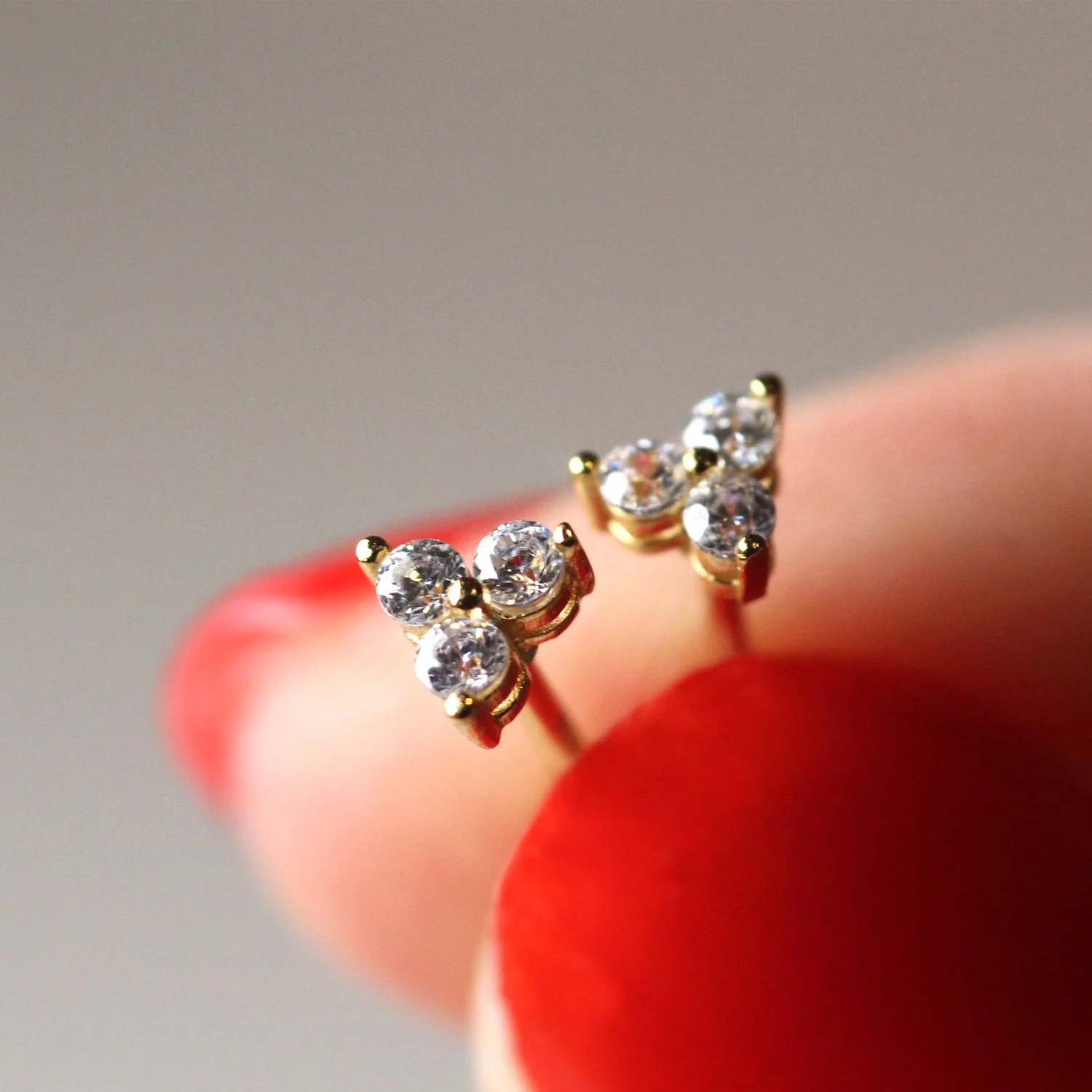 Elegant 14K gold earrings featuring three natural diamonds – luxury designer jewelry
