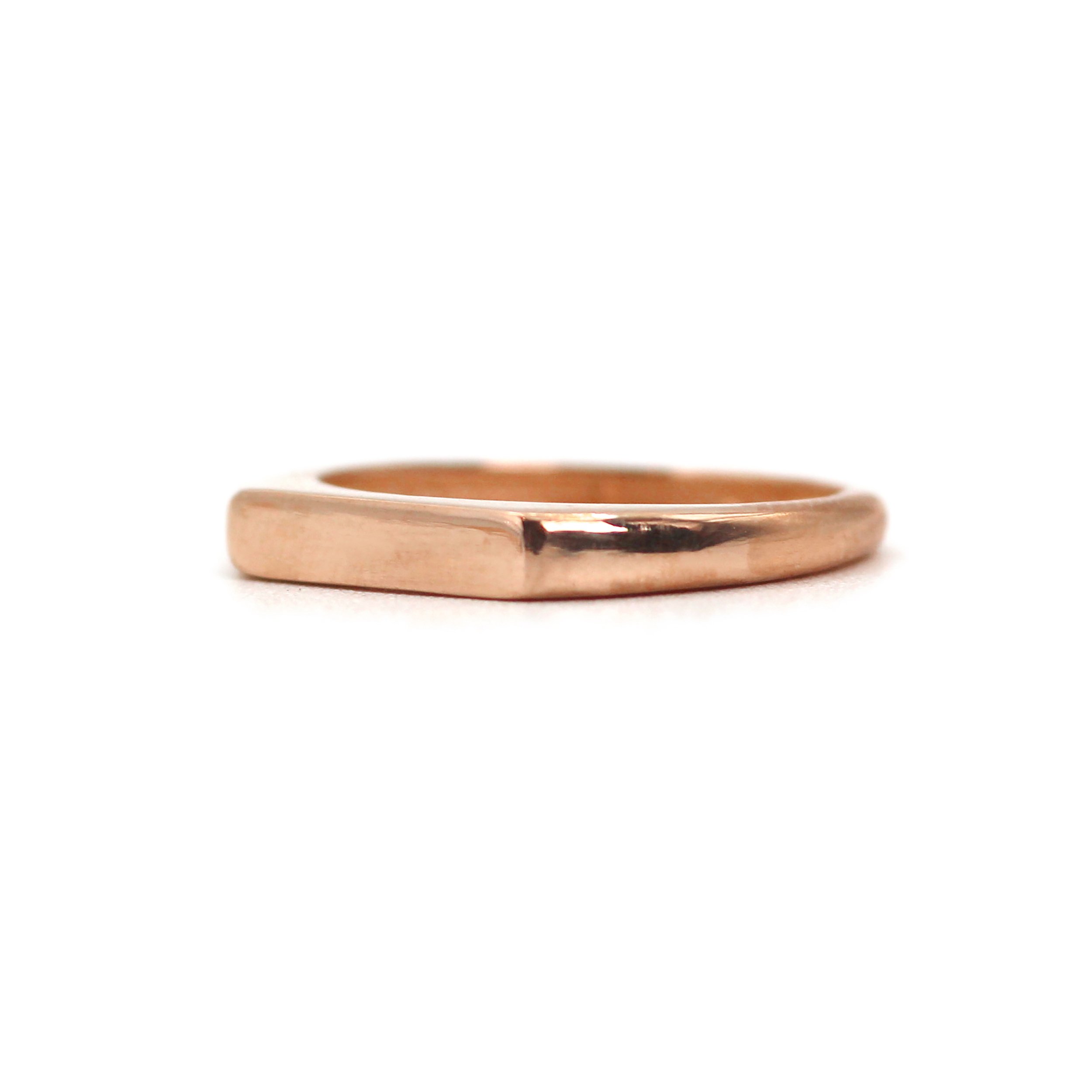Discover the 14K Signet Bar Gold Ring – a sleek, handcrafted gold ring with a modern bar design. Perfect for everyday wear or gifting. Made in NYC.