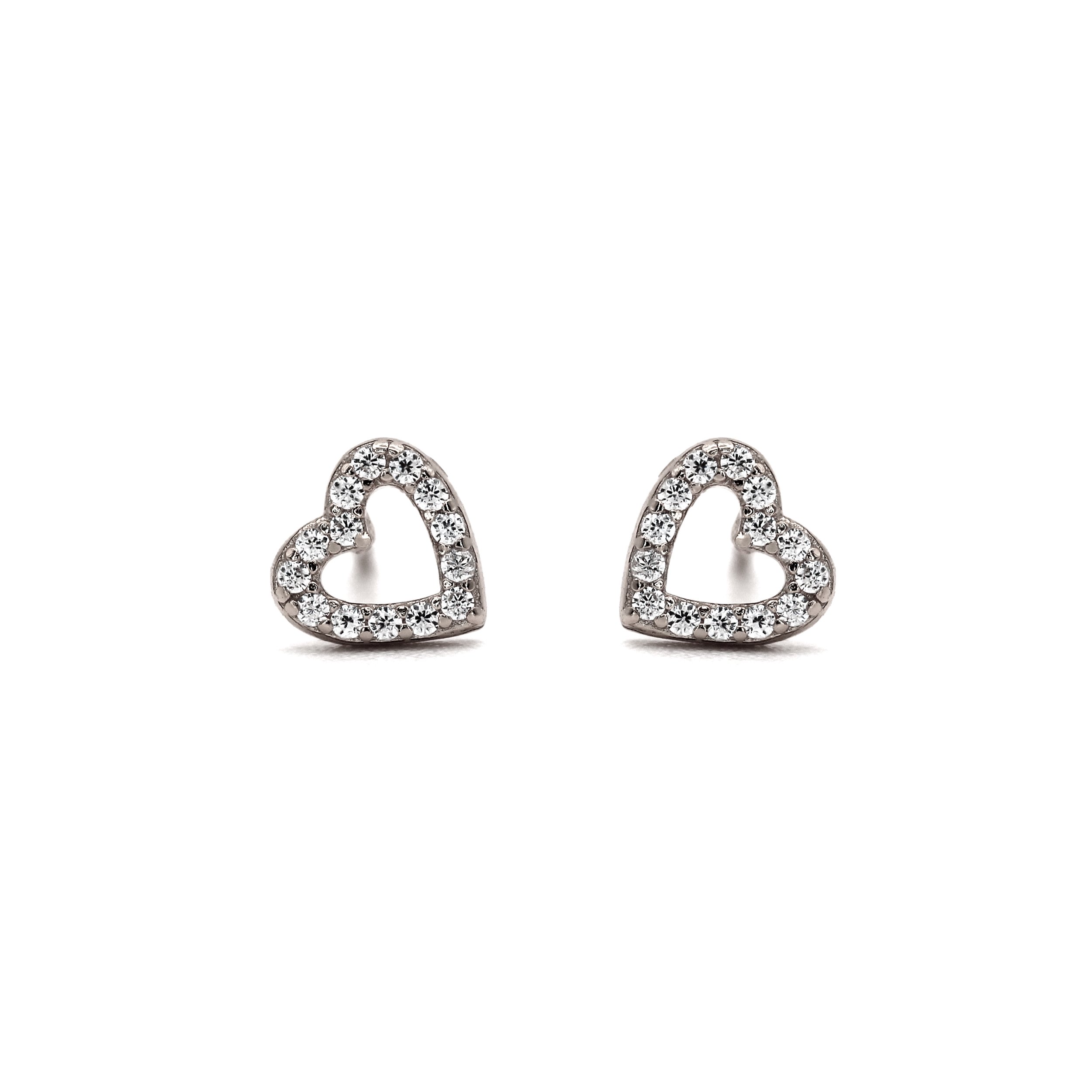 Adorable heart-shaped stud earrings in gold or silver. Perfect for gifting or everyday wear. Handcrafted with love by VicStoneNYC.
