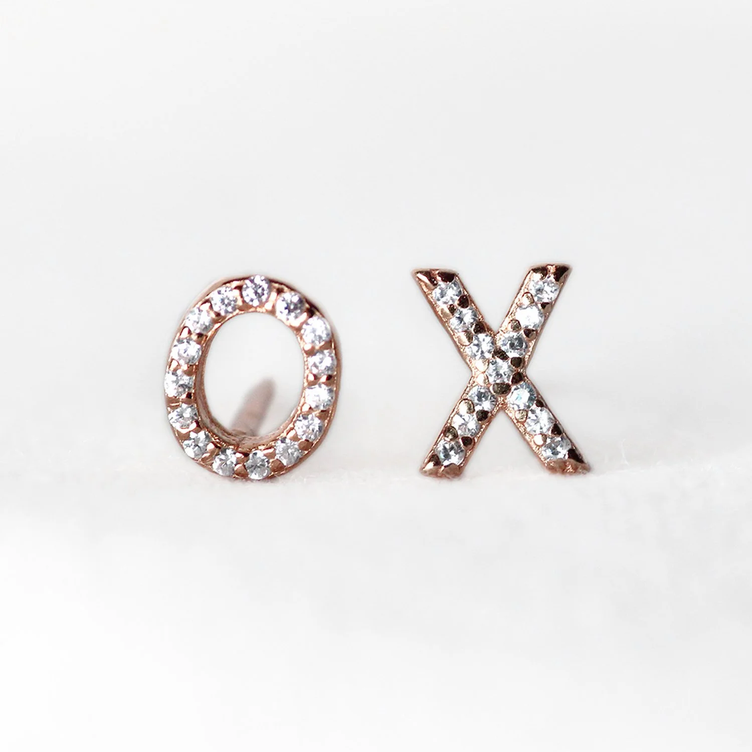 XO design stud earrings with natural diamonds in 14K solid gold