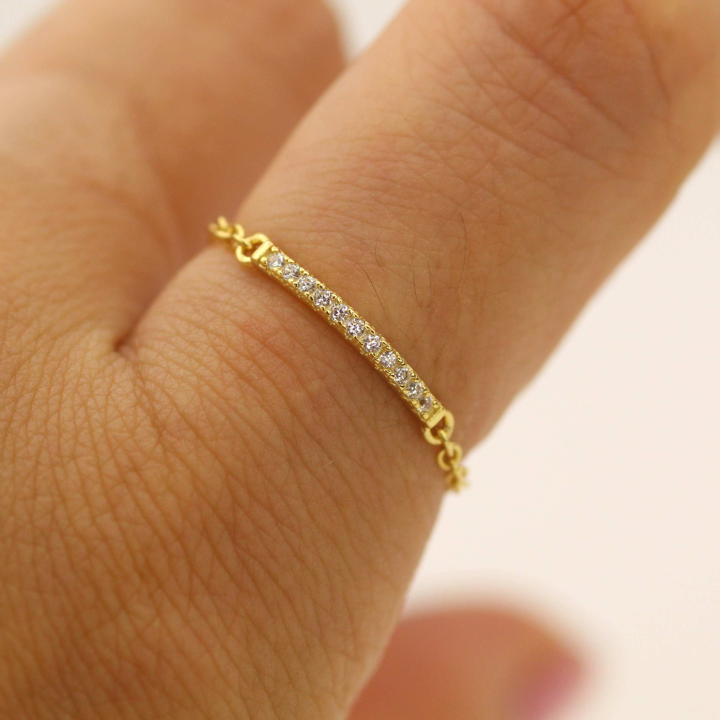 Close-up of yellow gold lab diamond ring – ethical fine jewelry