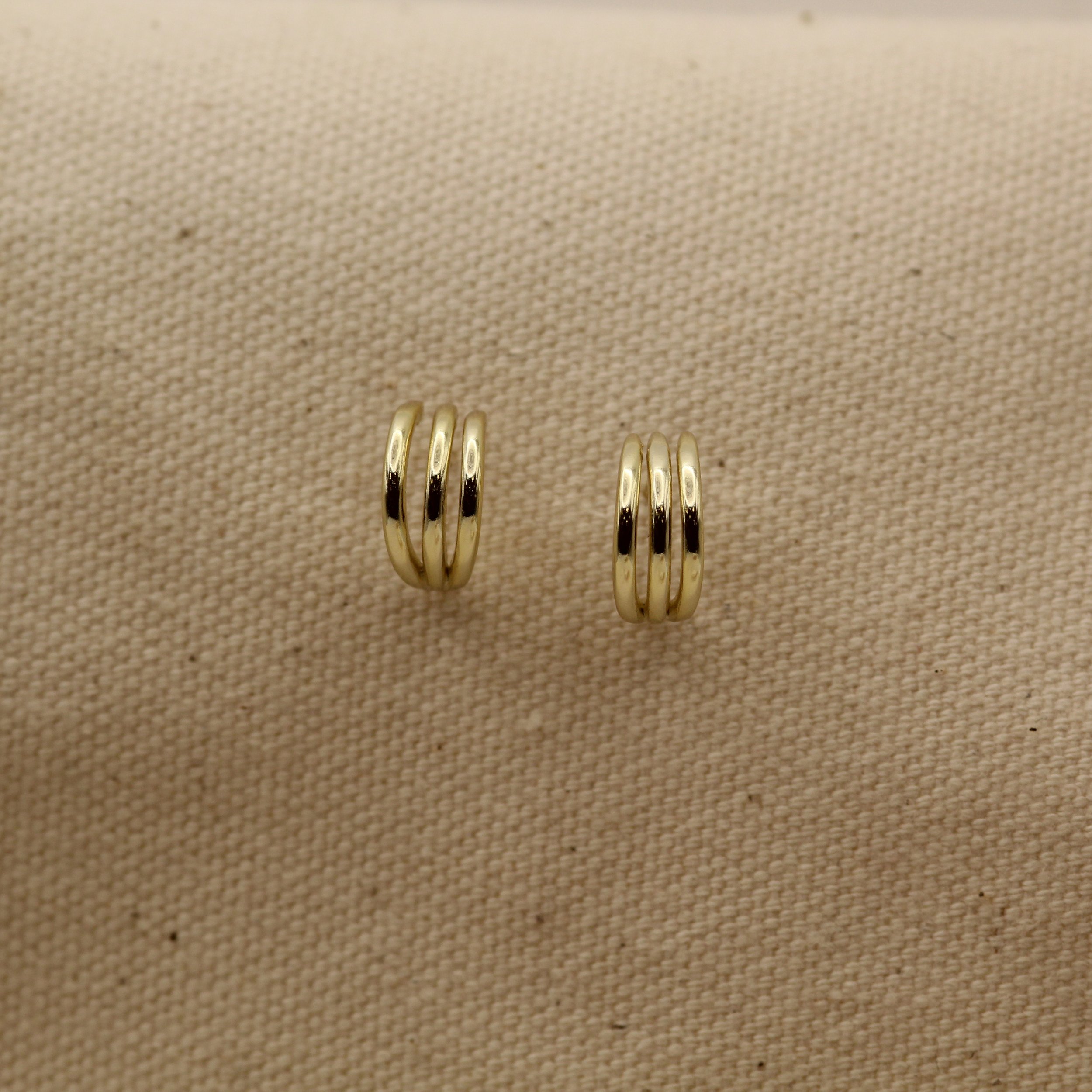 14K Three-Layer Line Huggie Gold Earrings – minimalist triple-band design in solid yellow gold