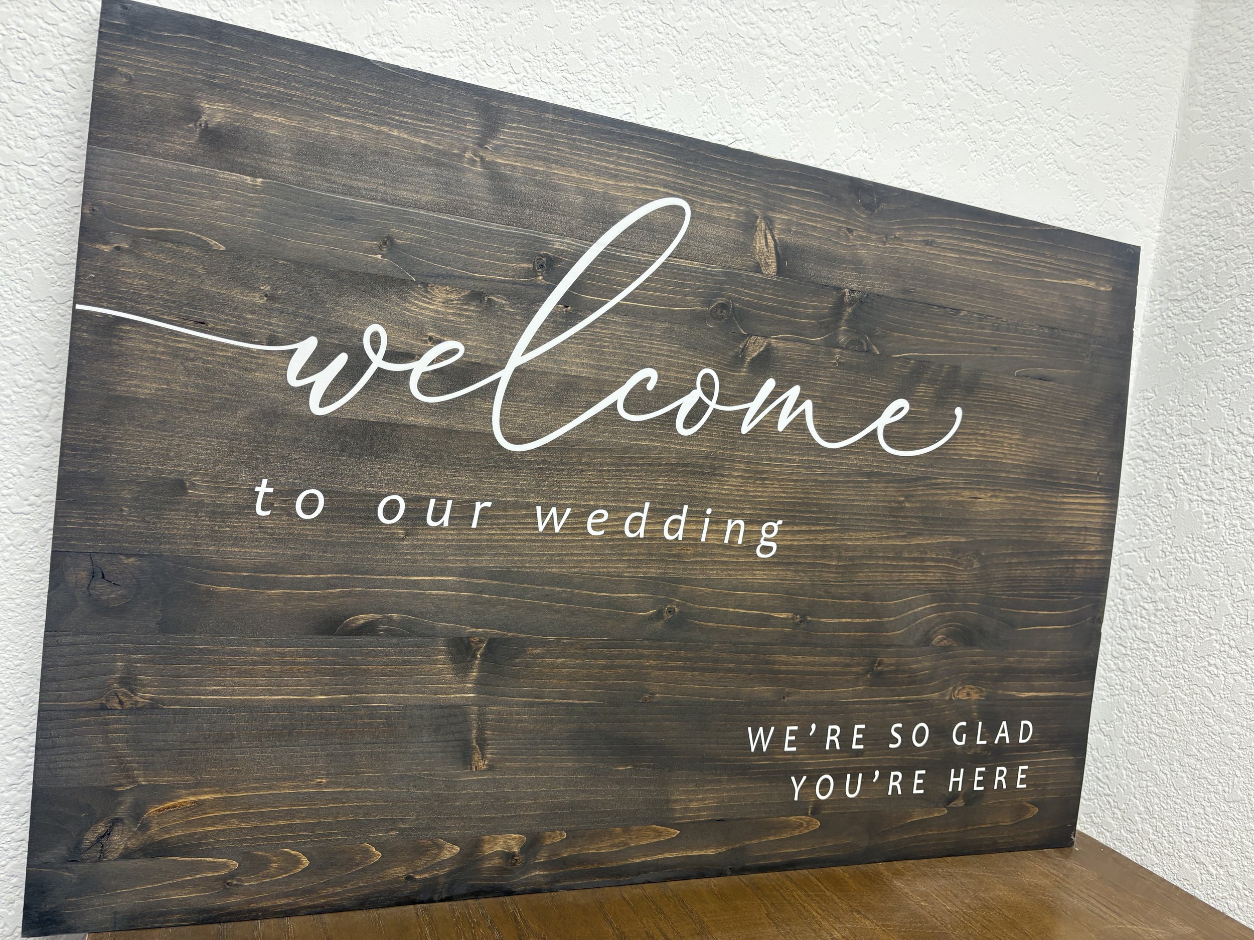 dark wood welcome sign