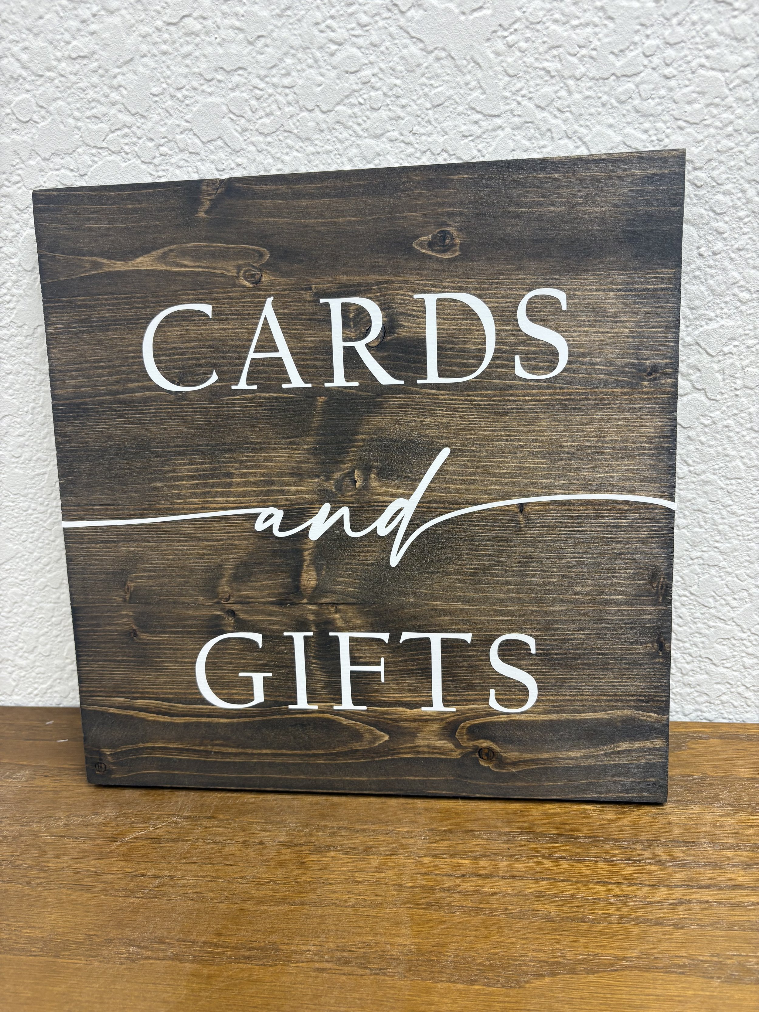 dark wood cards and gifts sign