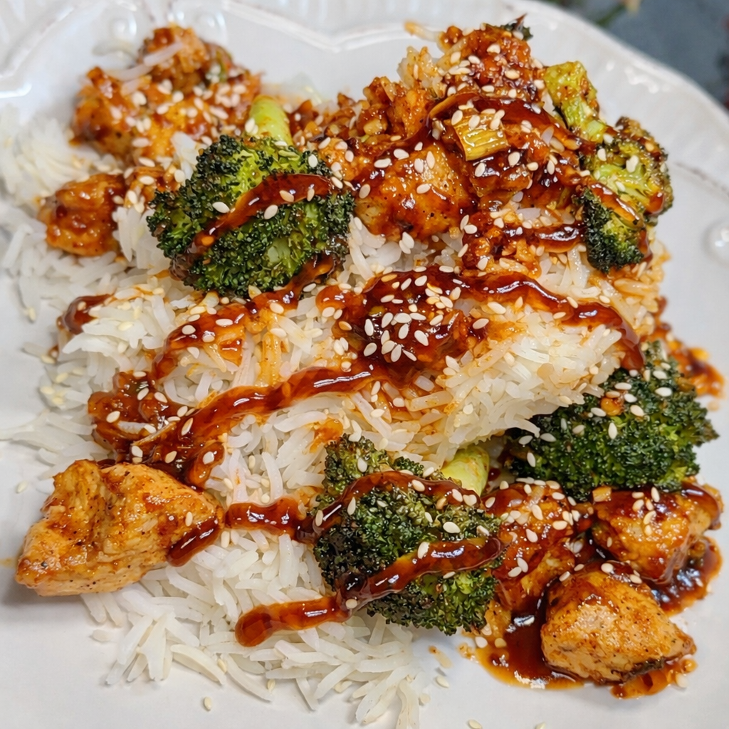 Honey Garlic Chicken                   with Broccoli + Rice