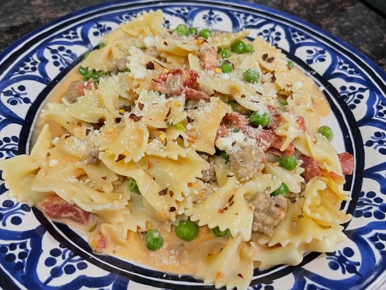 Creamy one-pot bow-tie pasta with sausage and peas