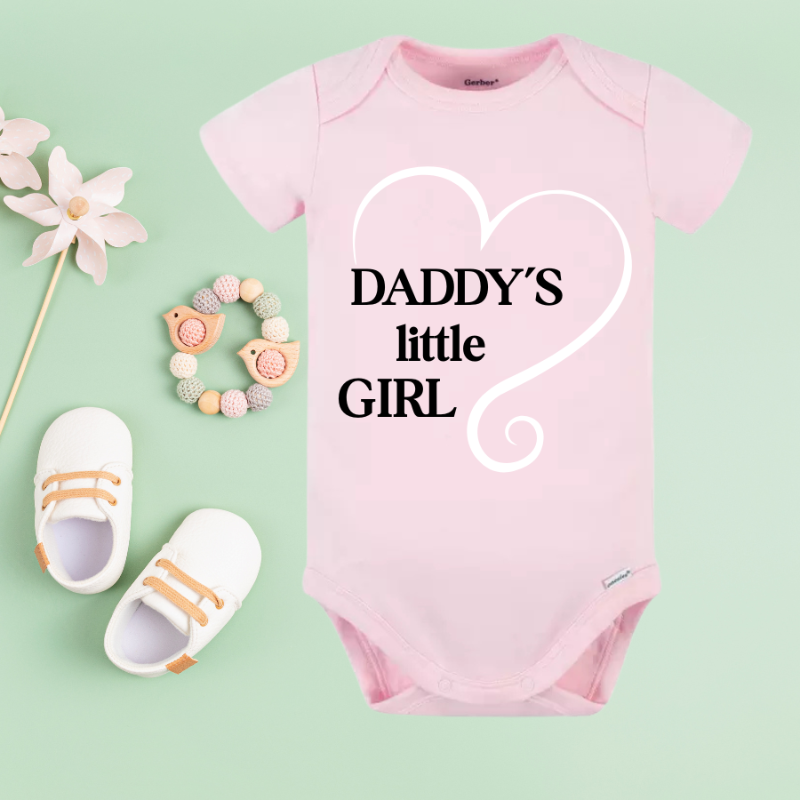 Baby onesie with the saying daddy little girl