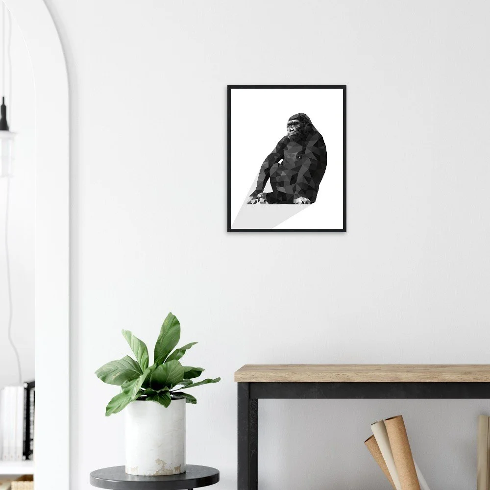 'Sylvaback' low-poly gorilla print in a black frame hung in a home den — striking modern wall decor by Toronto artist Miro Image