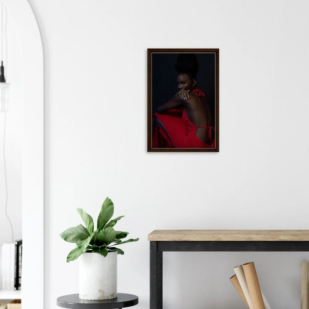 Framed portrait photograph 'Peaceful Chaos' hung in a home den — dramatic red and black wall art by Toronto artist Miro Image