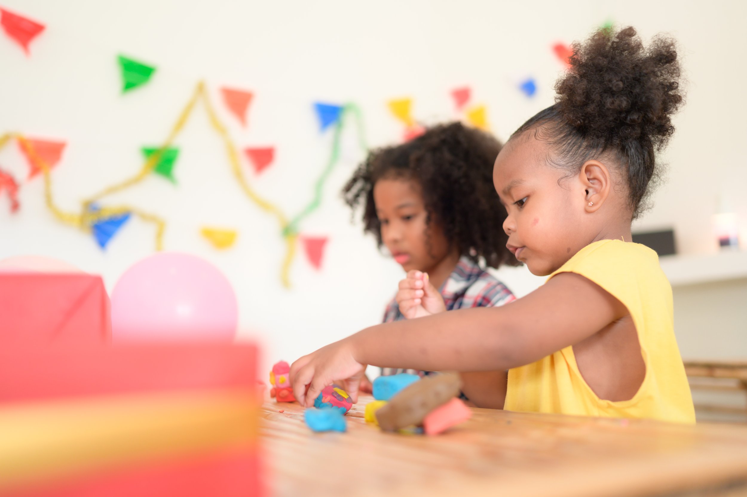 two-little-girls-playing-with-plasticine-2025-01-08-23-28-39-utc.jpg