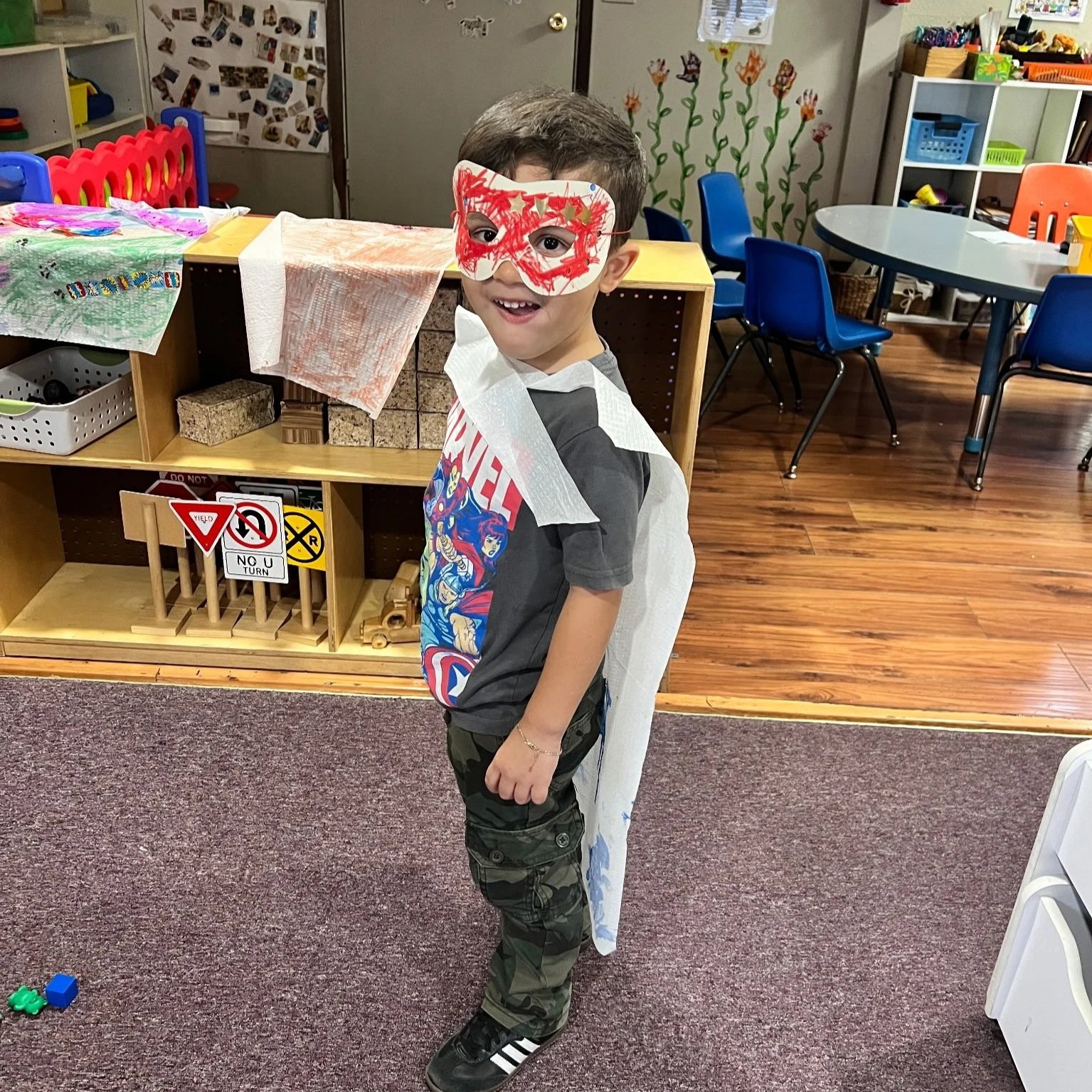 Child-friendly daycare space with age-appropriate toys, learning materials, and open areas that encourage exploration, social development, and hands-on learning.