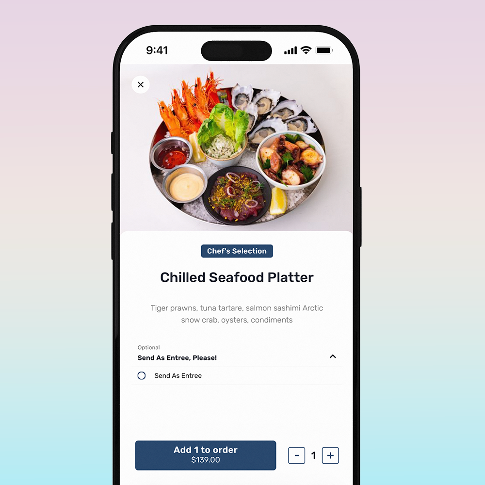 A smartphone screen displaying an online menu for a chilled seafood platter, which includes tiger prawns, tuna tartare, salmon sashimi, Arctic snow crab, oysters, and condiments, with a photo of the platter at the top.