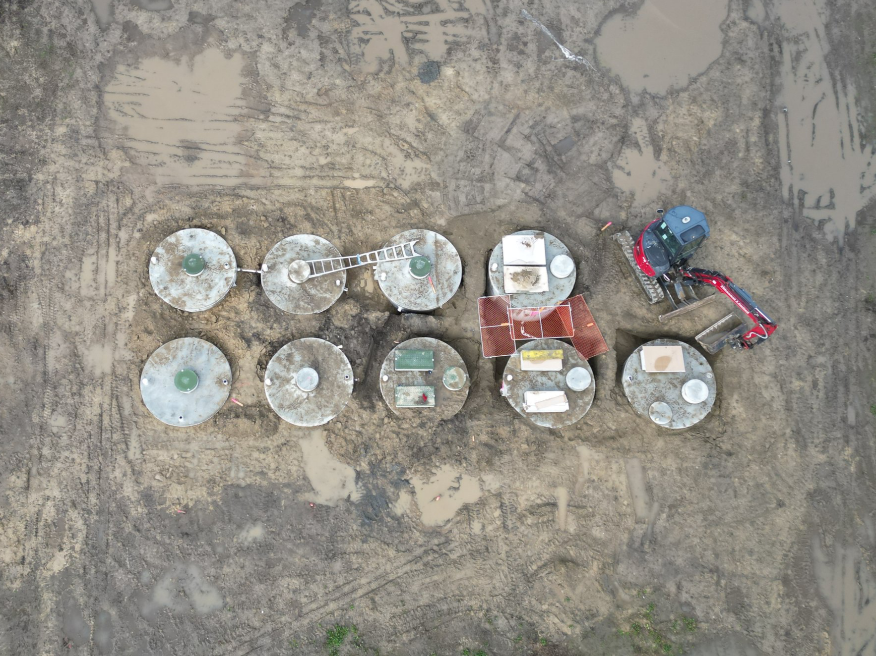 An aerial view of the centralised wastewater treatment system being installed as part of the Whenuakura Whānau Trust housing development. This sustainable, onsite solution supports all homes in the papakāinga, ensuring reliable and environmentally re