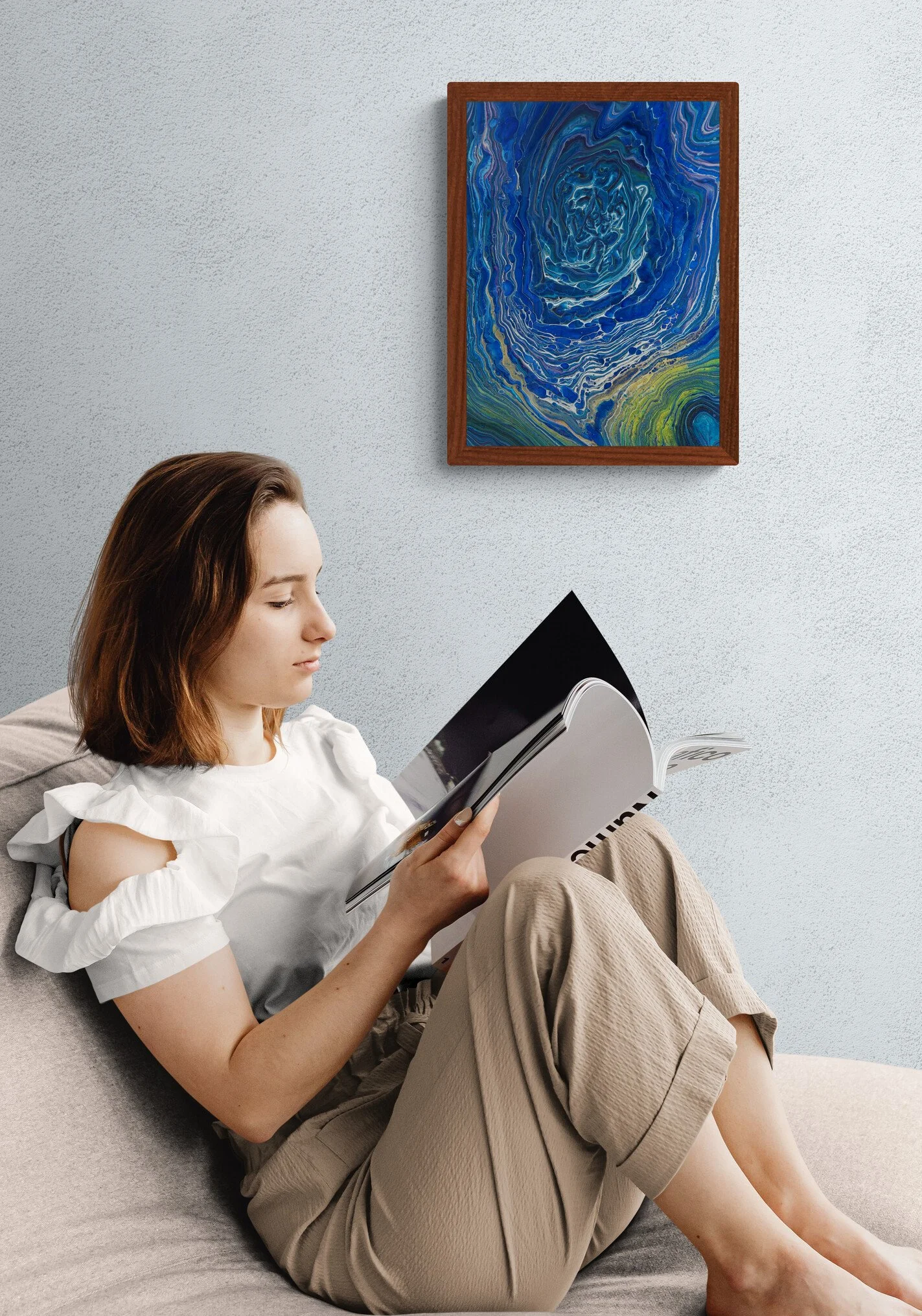 girl-reading-a-book-next-to-a-wall.jpg